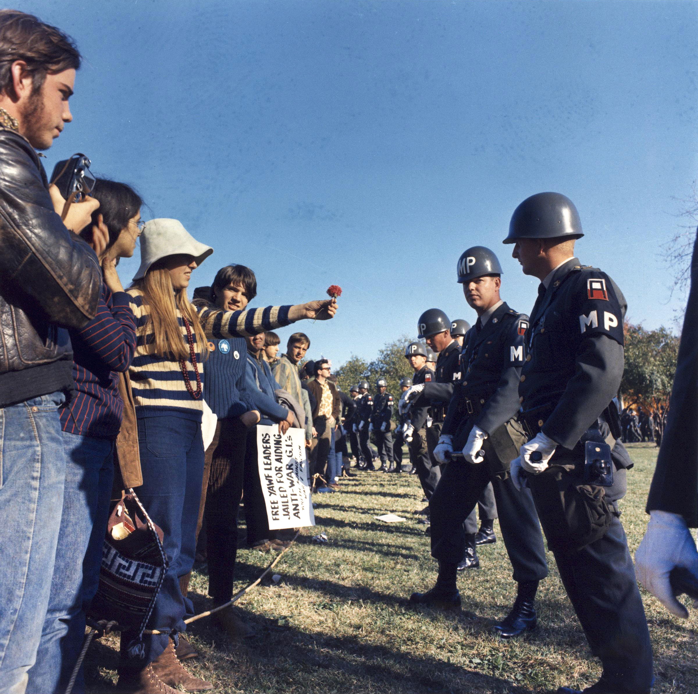 An anti-Vietnam War demonstrator offers a flower to military police at the Pentagon in 1967. The 1960s hippie movement is a classic example of a counterculture that actively opposed dominant societal values.