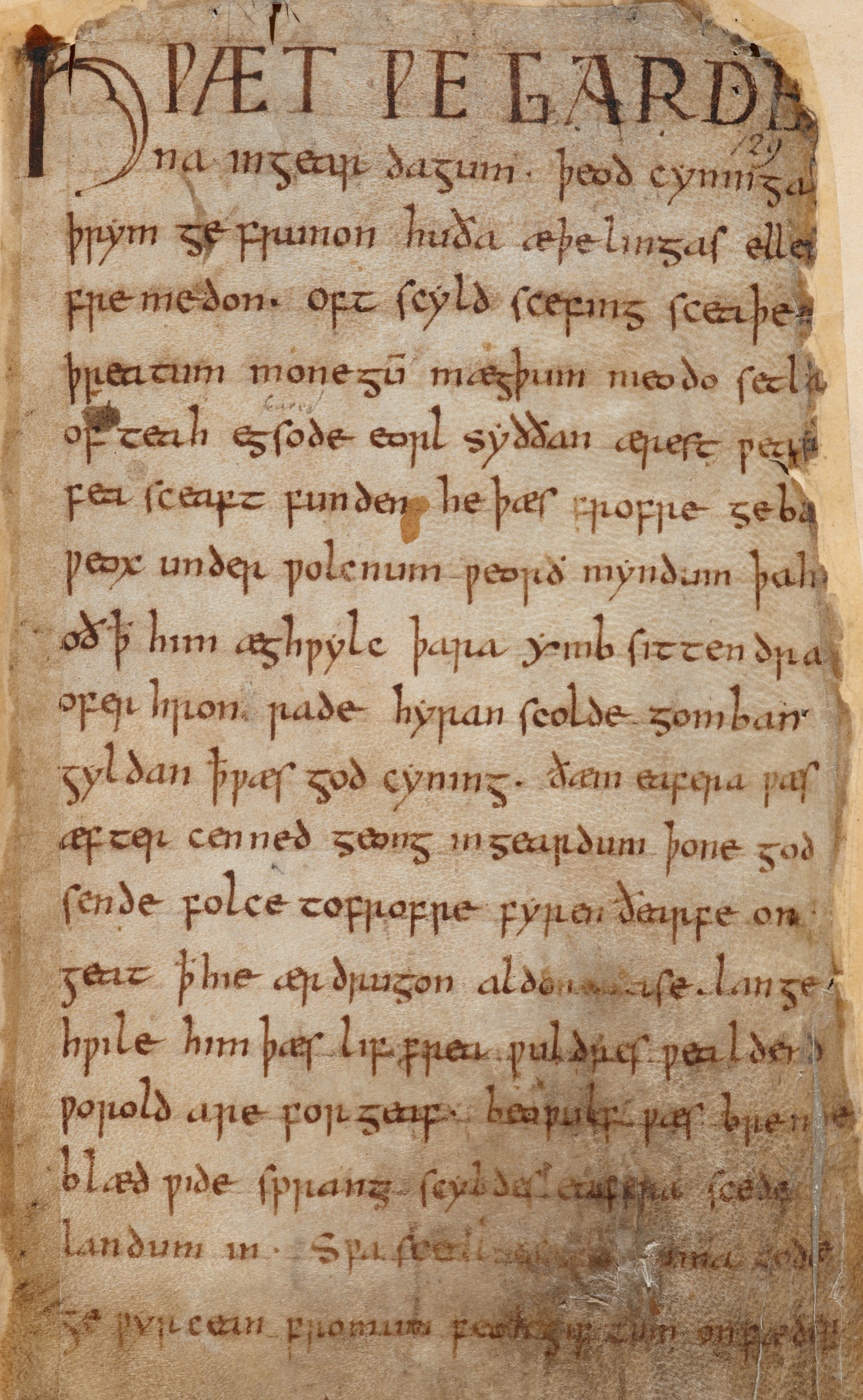 A manuscript page from the Old English epic poem Beowulf, demonstrating how the oral traditions of culturally significant heroic narratives were preserved and structured in written text.