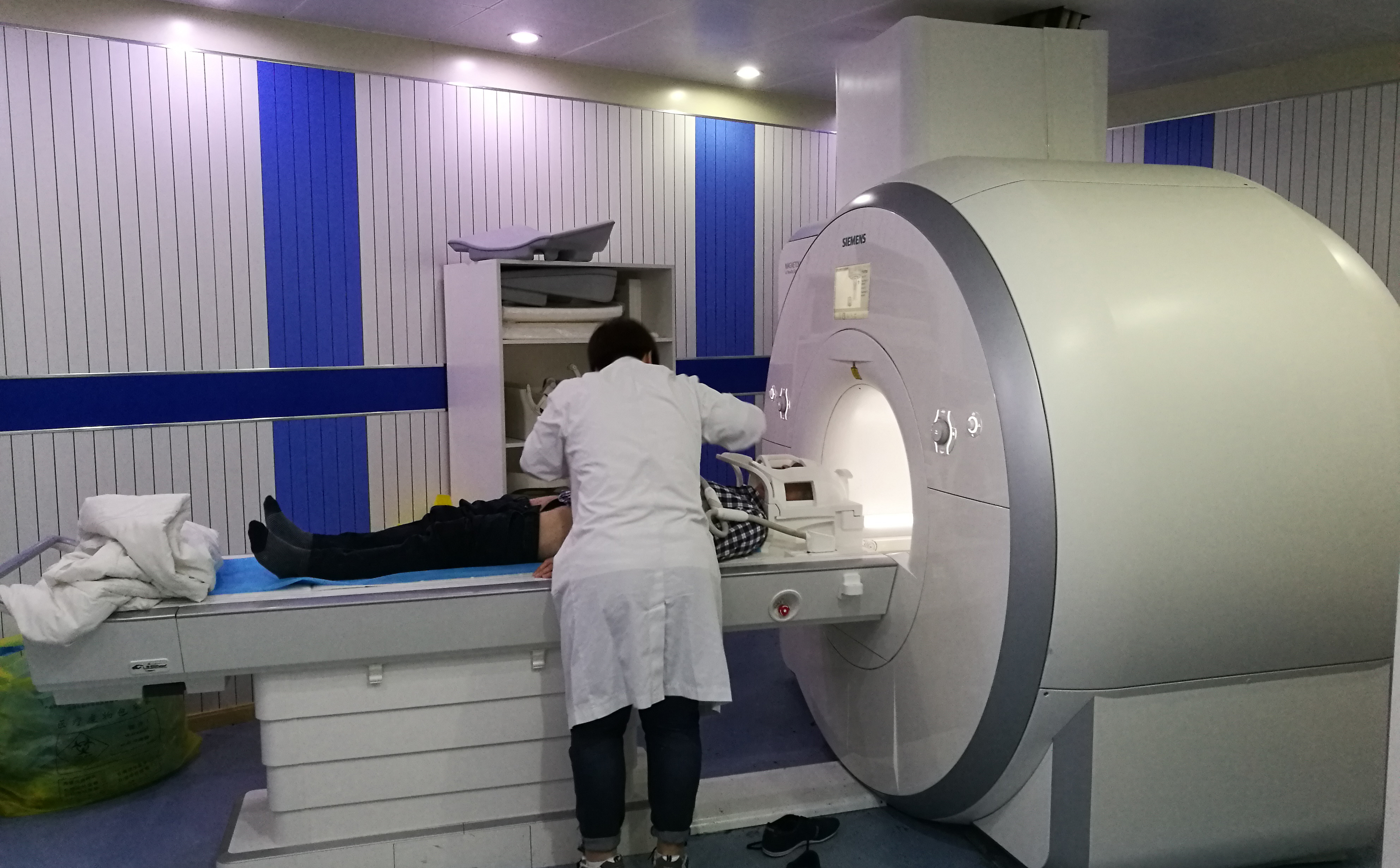 Expensive medical equipment like MRI scanners often rely on proprietary legacy software that cannot be patched. Compensating controls, such as strict network isolation, are required to mitigate this operational risk.
