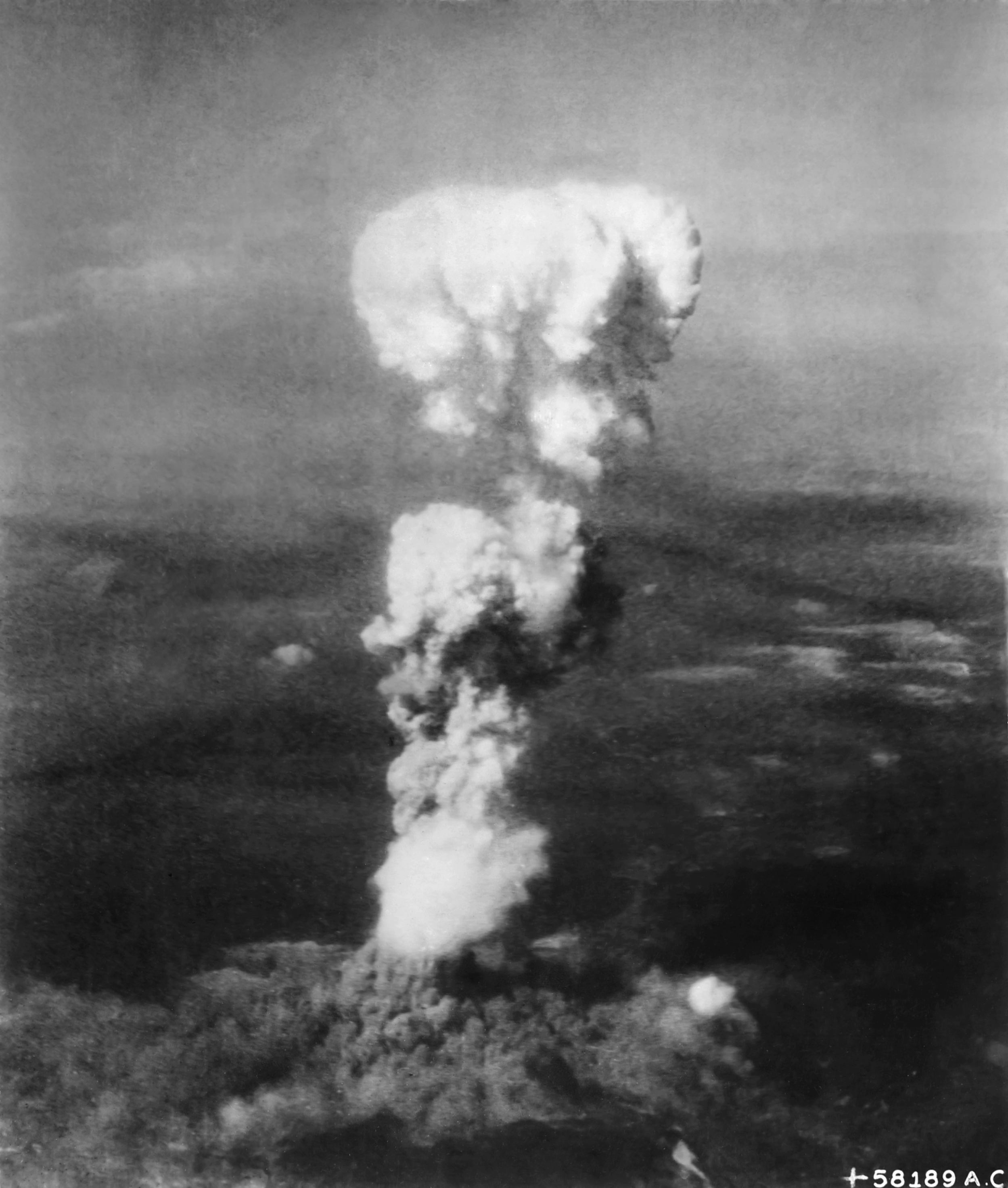 The mushroom cloud resulting from the detonation of the atomic bomb over Hiroshima in August 1945, which hastened the unconditional surrender of Japan.