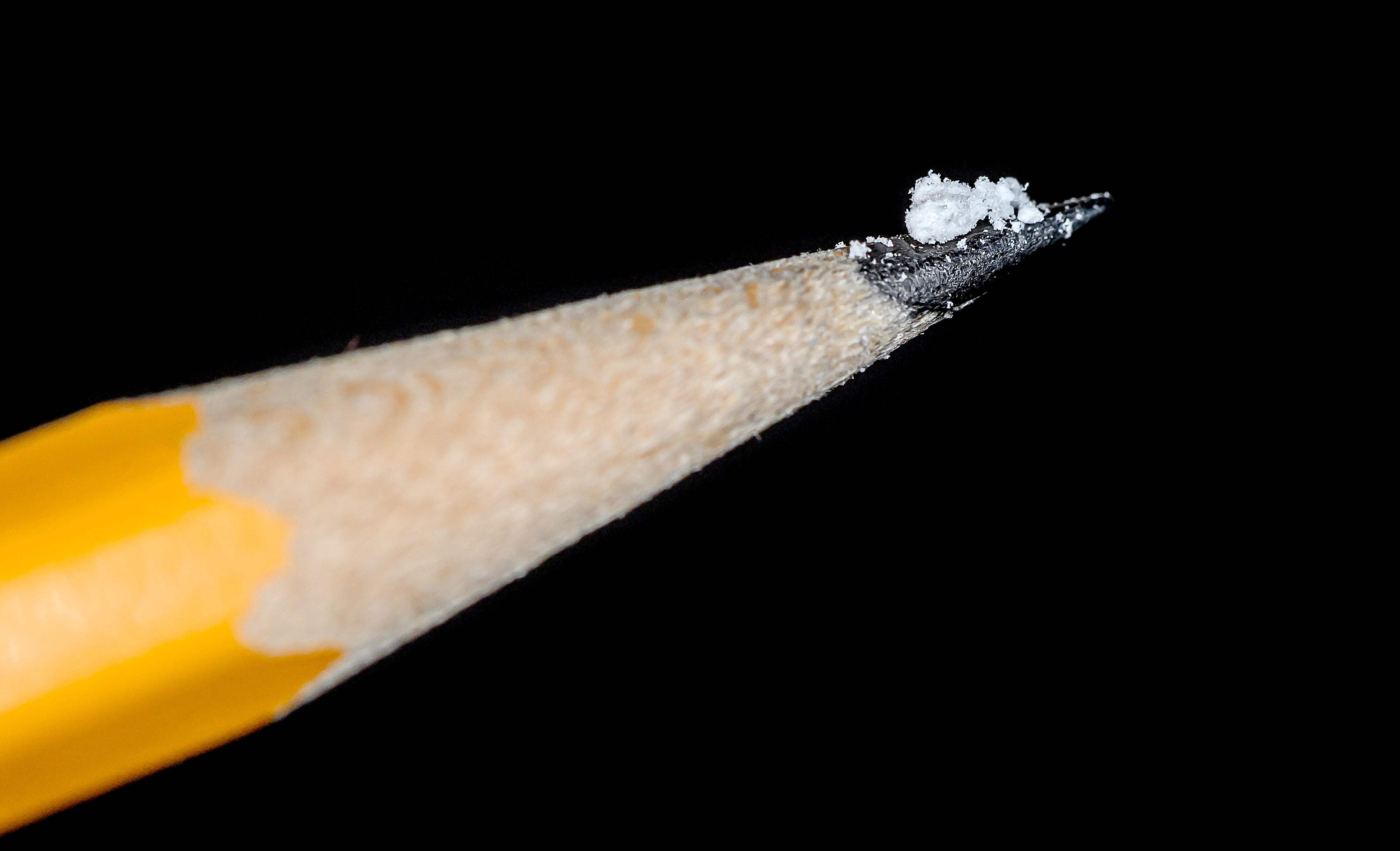 A lethal 2 mg dose of fentanyl on a pencil tip. This visualizes why a misplaced decimal point—which can increase a dose tenfold—is a life-threatening error.