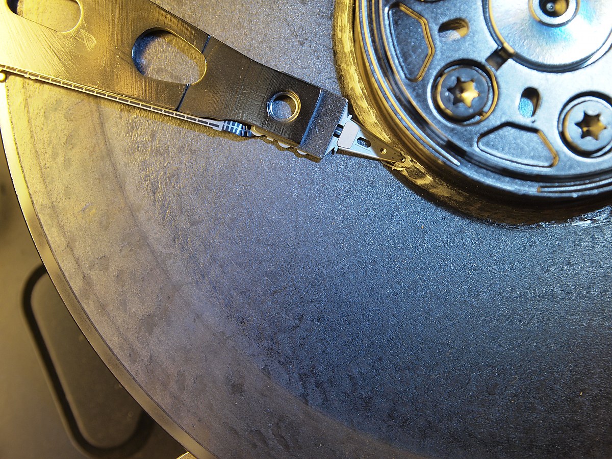 A head crash resulting in severe physical damage to a hard disk's platters, a hardware failure that triggers acute psychological stress for the user relying on that data.