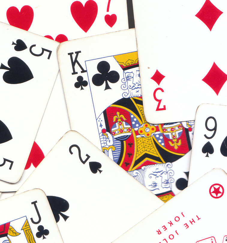 A standard 52-card deck consisting of four suits. Drawing from a standard deck provides a practical model for testing how probabilities shift when items are not replaced.