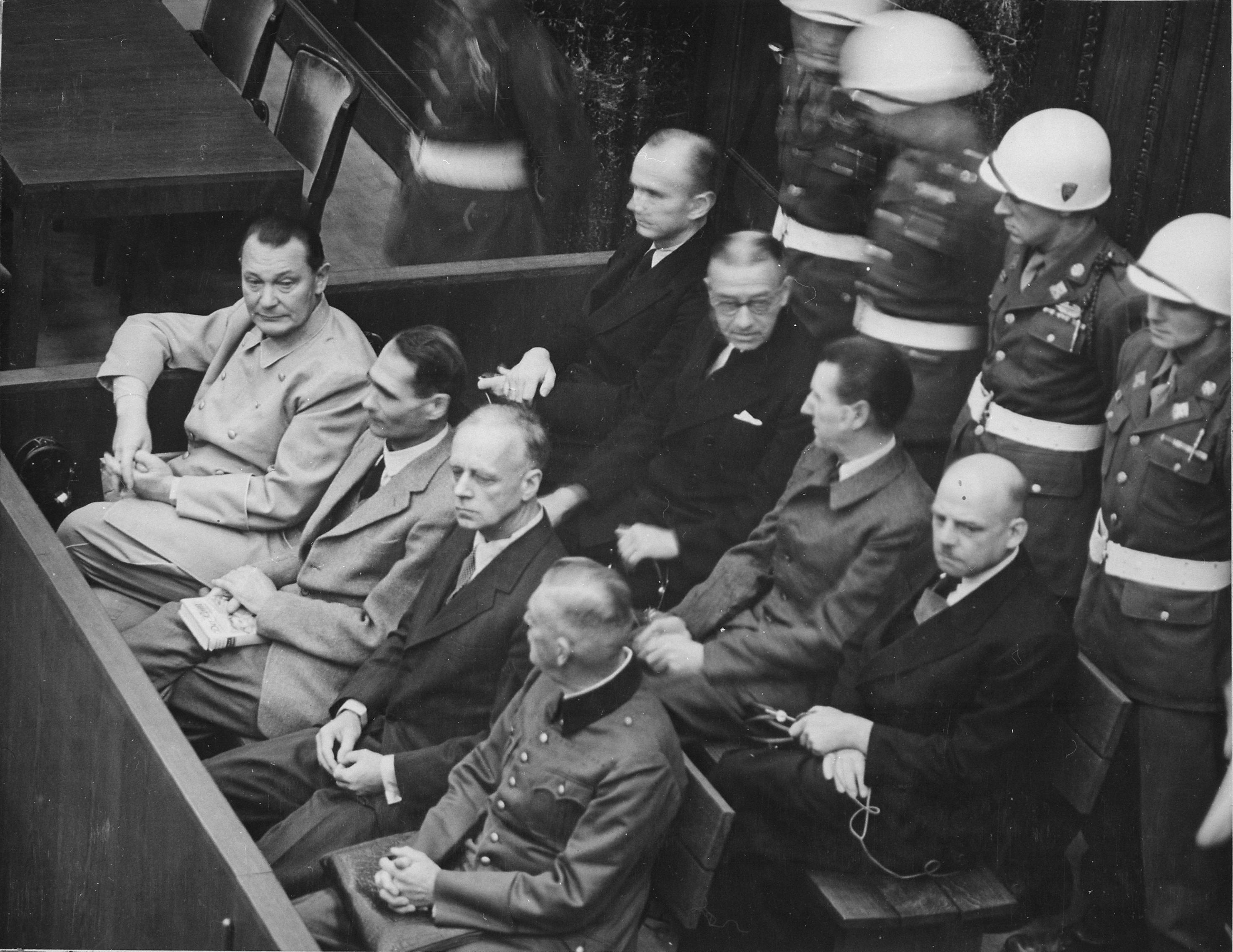 Nazi leaders seated in the defendants' dock during the Nuremberg Trials, which established foundational precedents for international human rights law.