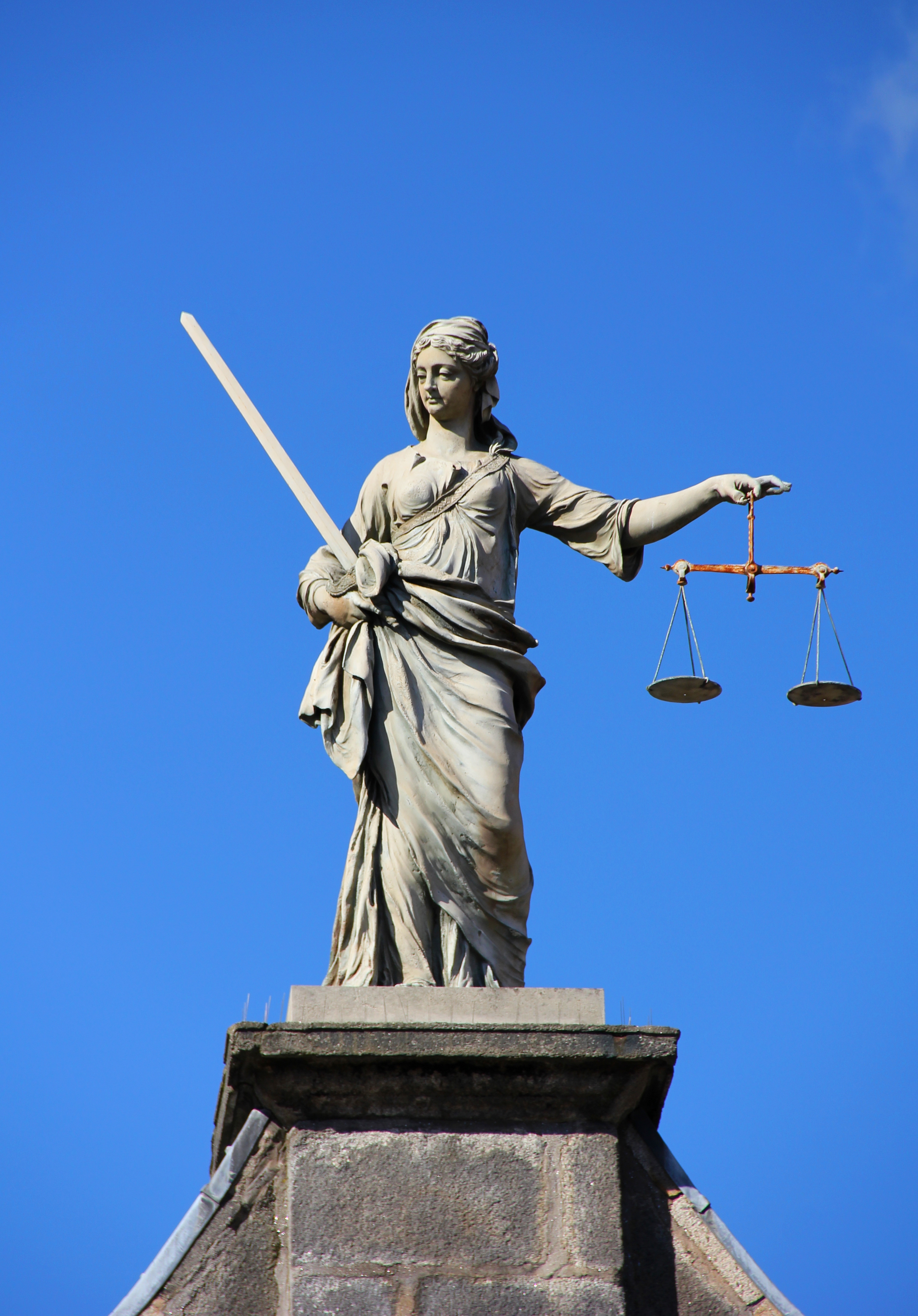 In argumentative writing, claims and evidence must be carefully weighed and logically aligned, much like the traditional scales of justice.