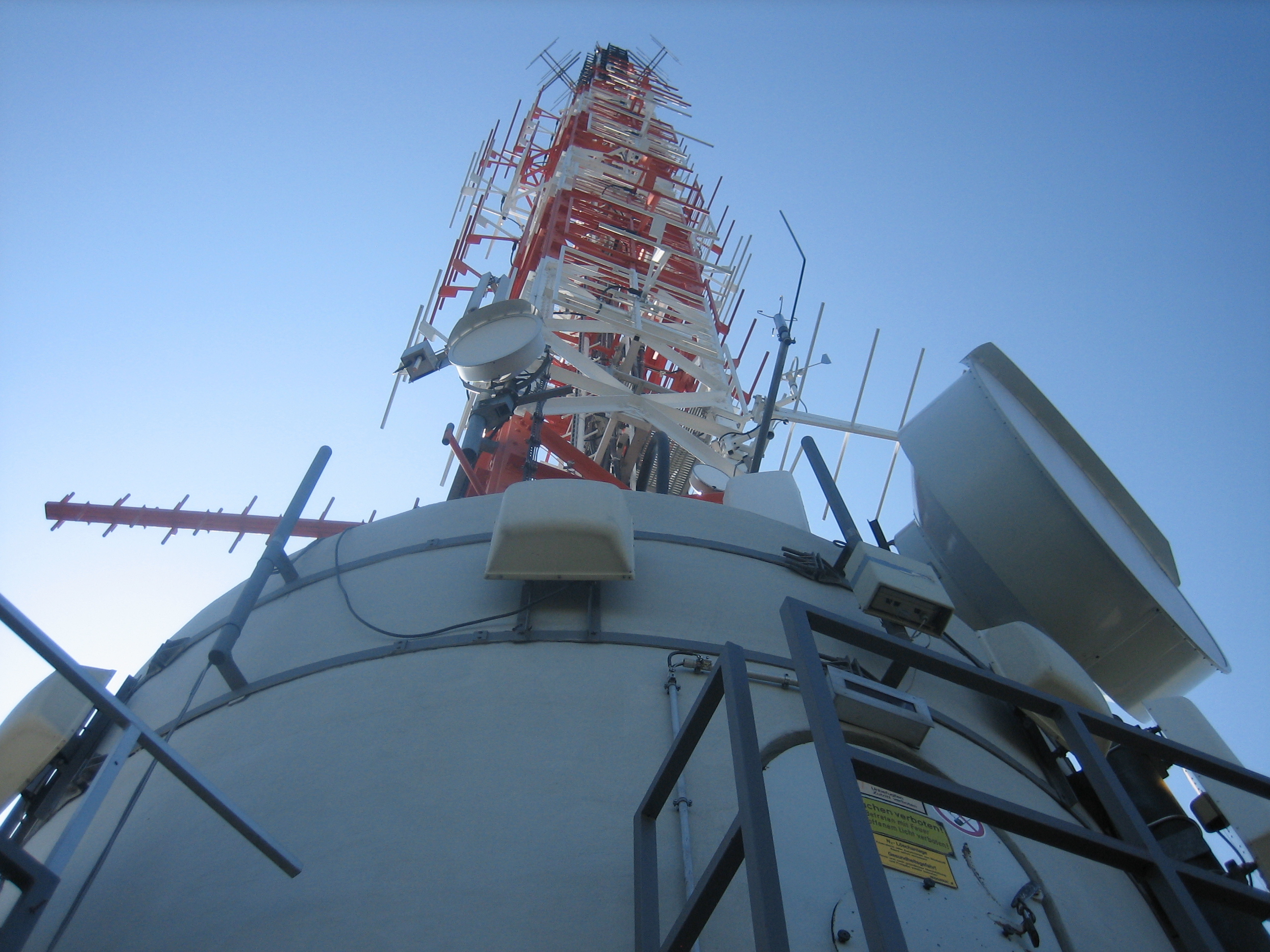 Think of the author's tone as the broadcasting tower transmitting an attitude, while the reader's mood is the emotional signal ultimately received.