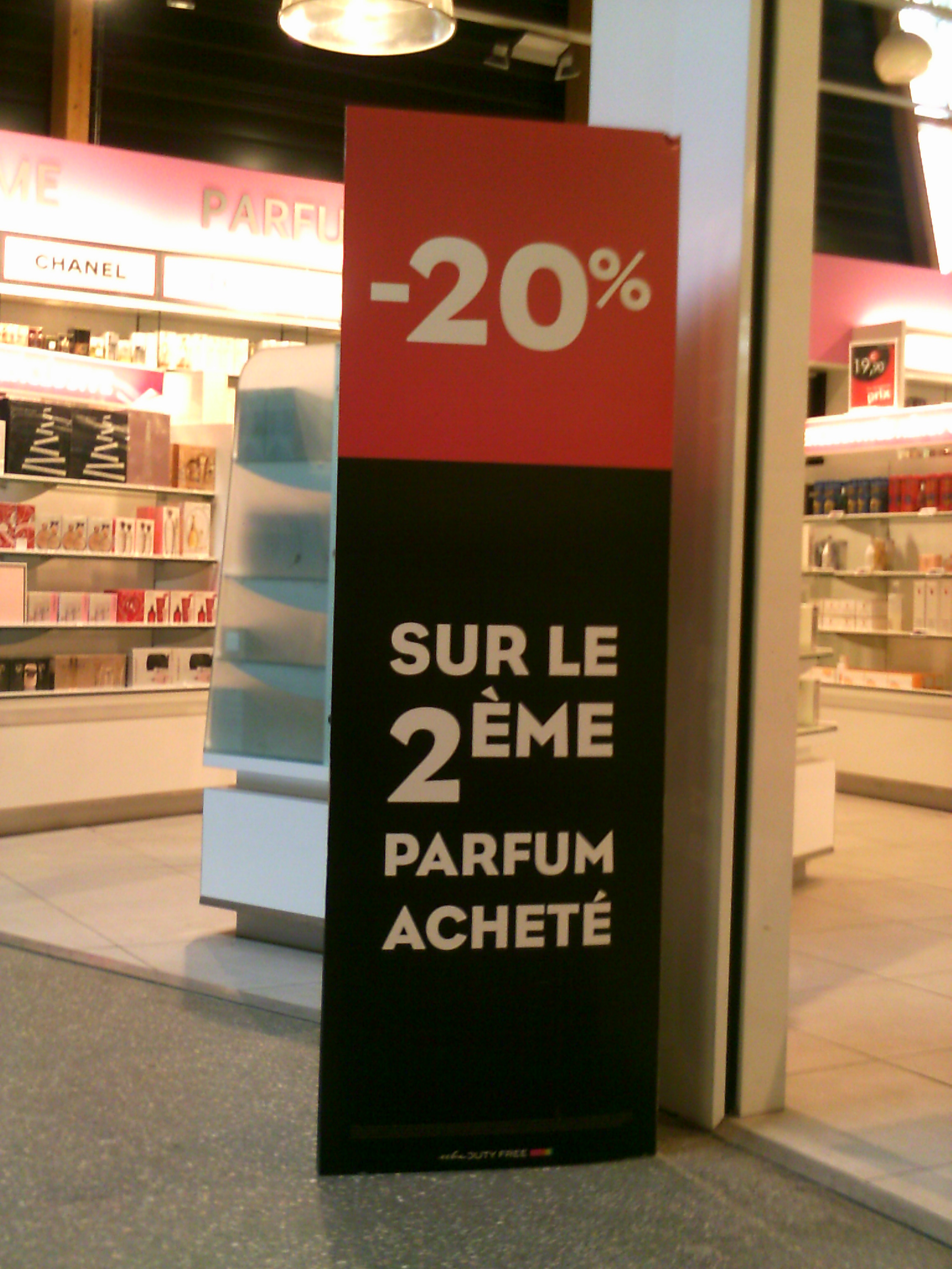 A retail placard advertising a 20% markdown. Understanding percents is essential for consumers who need to calculate the final discounted cost of goods on clearance.