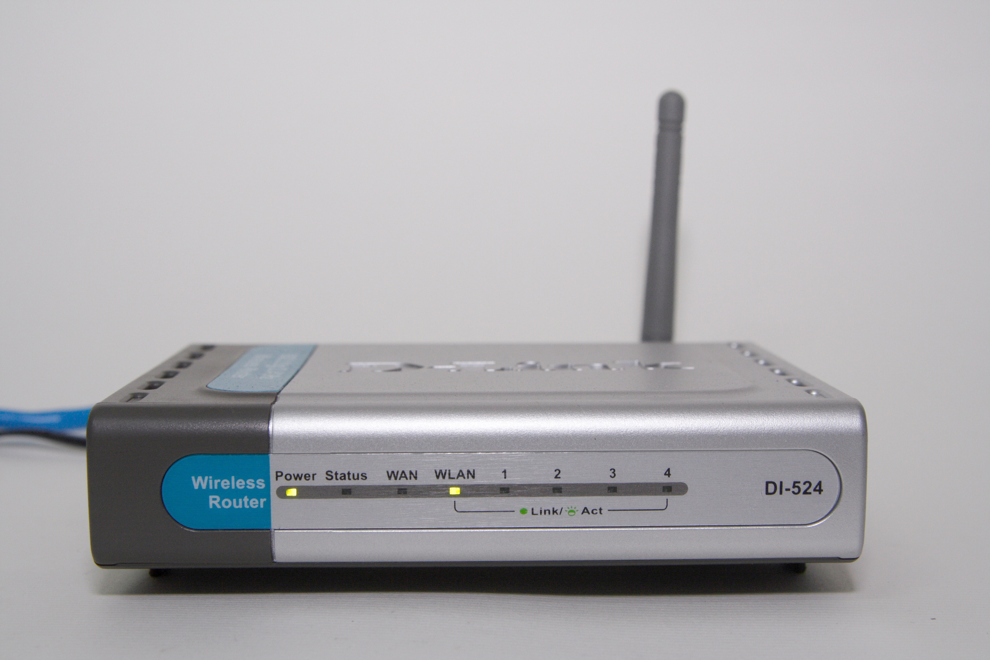 A consumer-grade wireless router. Plugging unauthorized hardware into a corporate subnet introduces major vulnerabilities by completely circumventing established security architectures and monitoring tools.