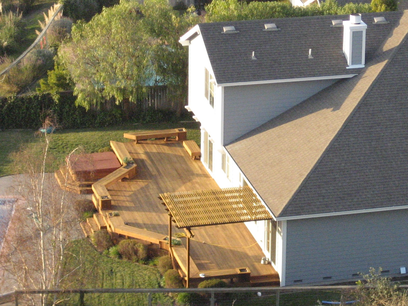 Physical property improvements, such as the addition of a backyard deck, directly increase a parcel's assessed value, which in turn permanently increases the owner's ad valorem tax liability.