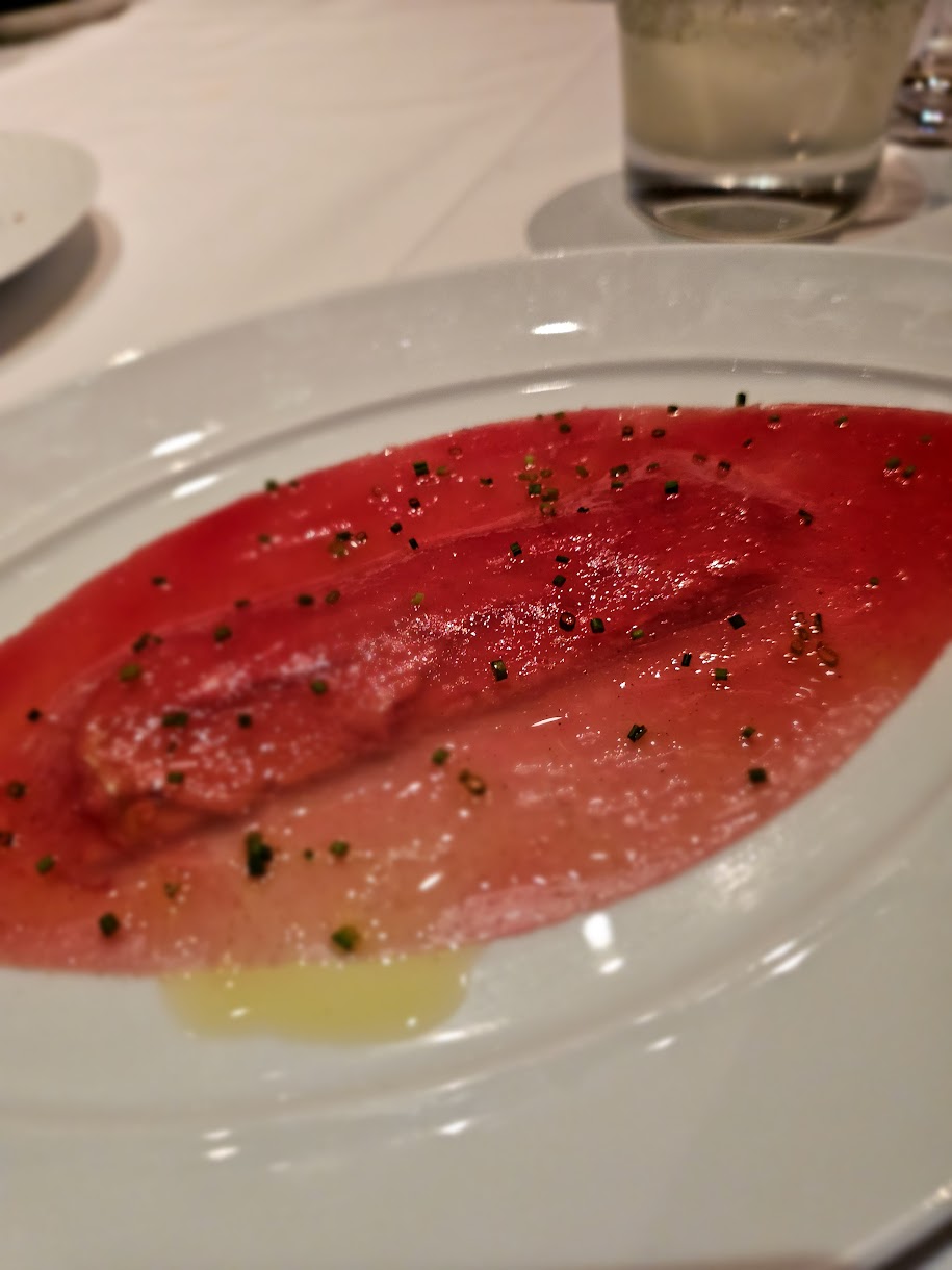 A dish from Le Bernardin. Taking clients to lavish dinners to secure a listing represents the independent contractor assuming their own economic risk; the broker is not responsible for these business expenses.