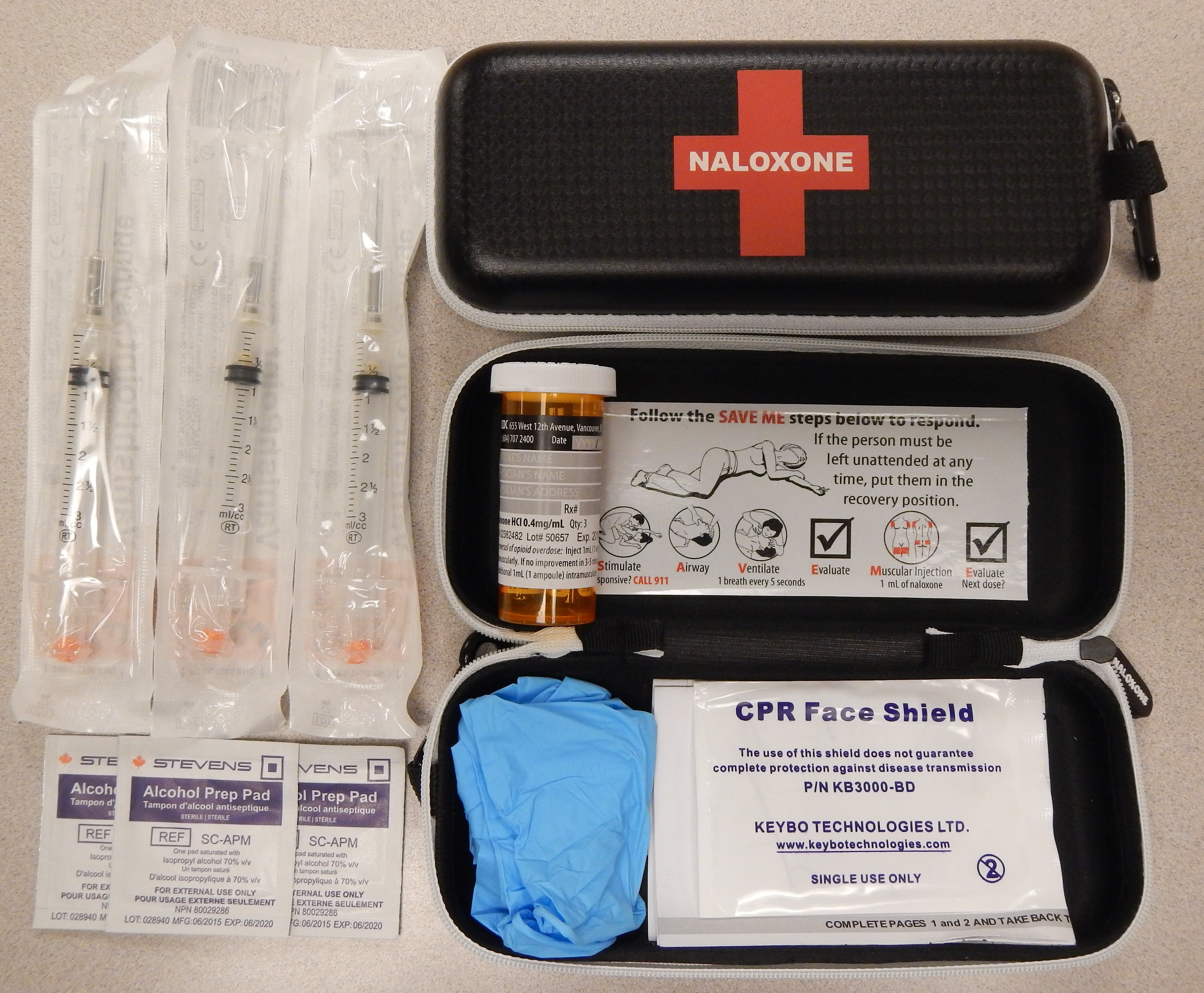 A standard emergency kit containing naloxone, the specific pharmacological antidote used to rapidly reverse an opioid overdose.