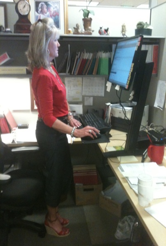 A sit-stand desk provides flexible physical environments, allowing students to channel excess energy or adjust their posture to maintain focus.