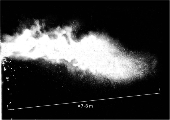 A turbulent multiphase plume from a sneeze. Droplets larger than 5 microns are pulled down by gravity, typically landing within a three-foot 'splash zone' of the infected client.