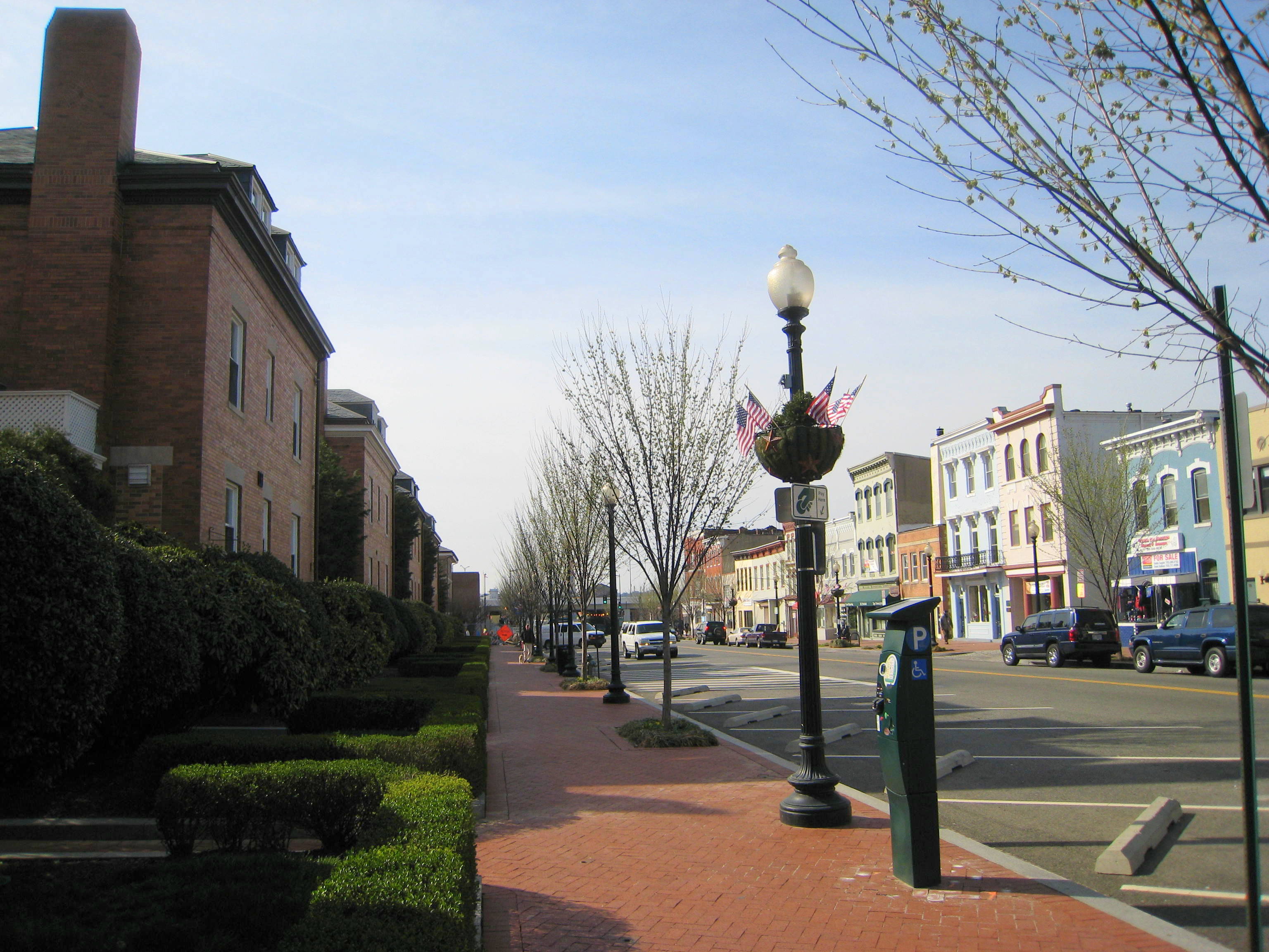 A classic mixed-use configuration: ground-floor retail generates premium yield through street visibility, while upper-floor residential units provide a steady cash flow.