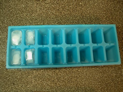 An ice cube tray serves as a physical analogy for allocated memory blocks. If too much data is forced into a single slot, it violently spills over into adjacent, otherwise unrelated spaces.