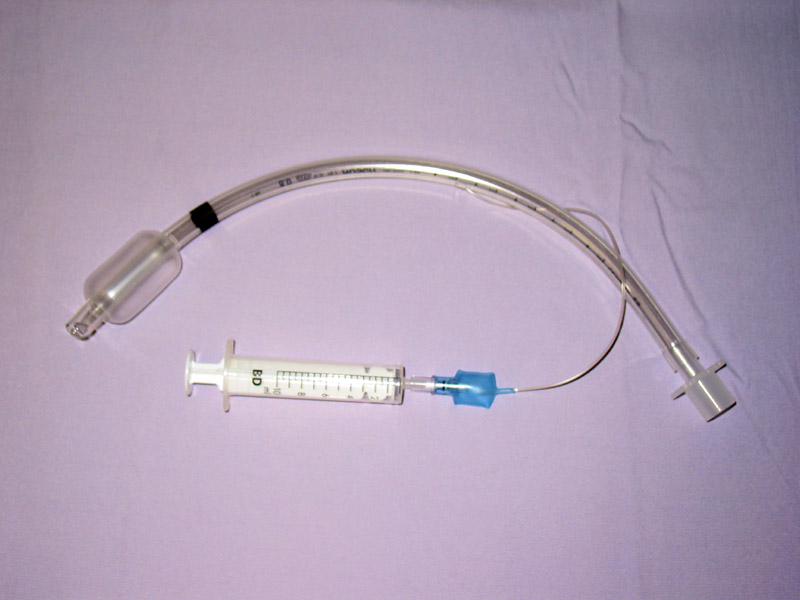 A standard cuffed endotracheal (breathing) tube. If a client lacks medical decision-making capacity—such as a patient with a severe traumatic brain injury—healthcare staff must legally intervene to prevent them from removing life-saving devices.