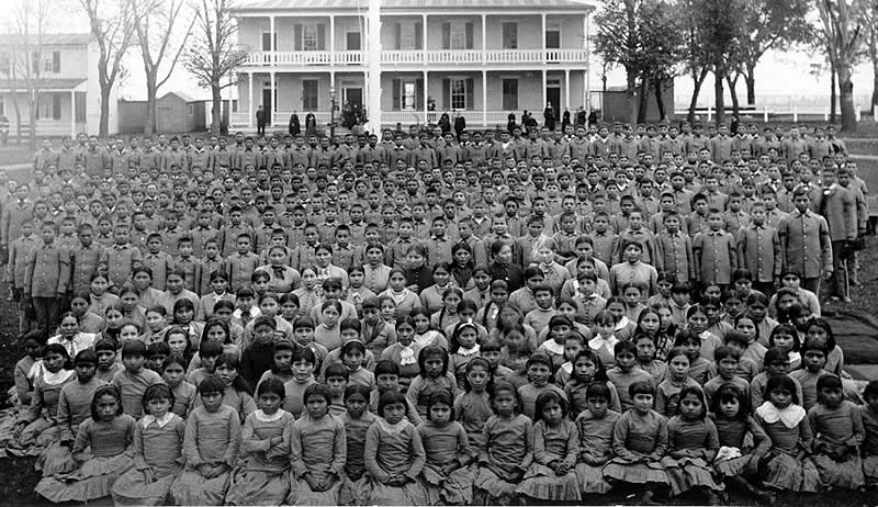 Students at the Carlisle Indian Industrial School. Boarding schools like this were central to federal assimilation policies designed to erase Native American culture, language, and identity.