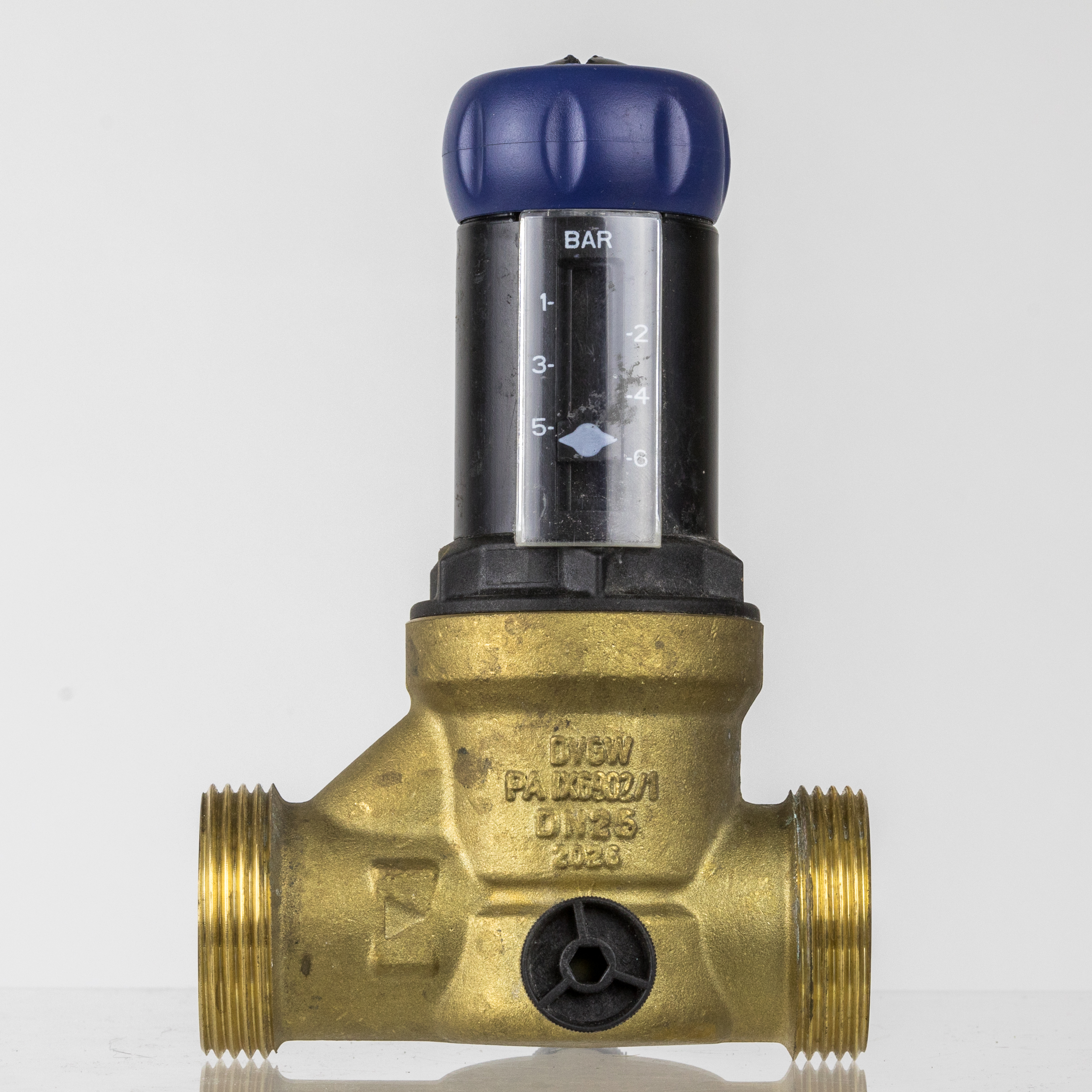 A domestic water pressure regulator, which safely lowers incoming municipal water pressure to prevent damage to delicate interior plumbing fixtures.