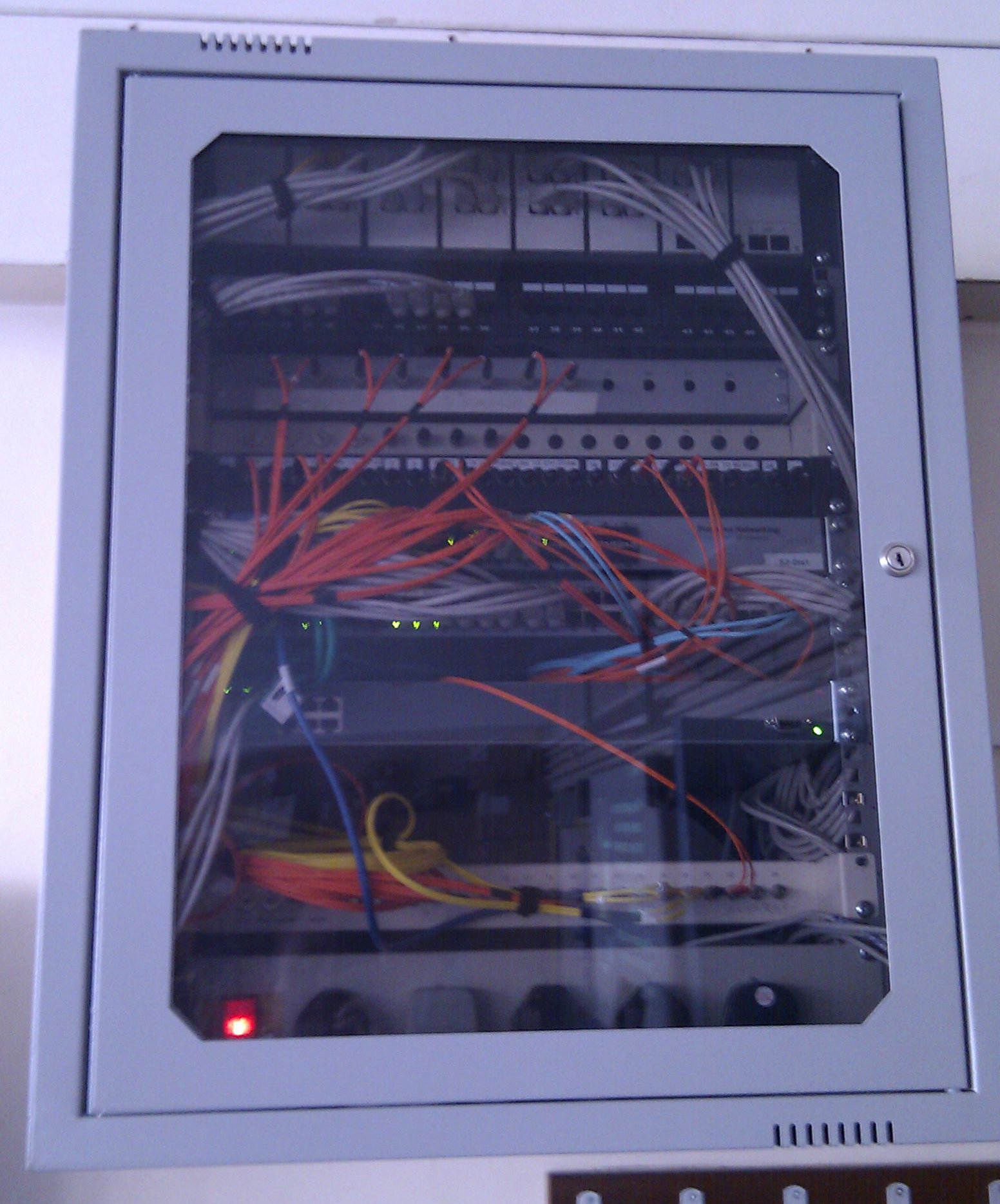 Physical optical fiber interconnects used in networking facilities, representing the dedicated, physical links utilized by AWS Direct Connect to bypass the public internet.