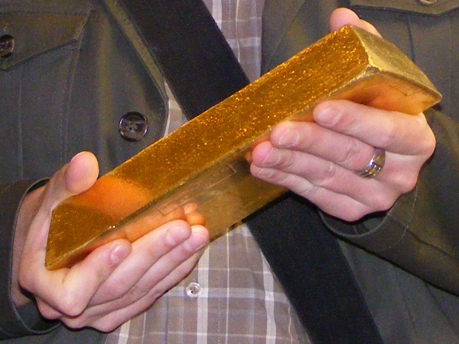 Hard assets, such as physical gold bullion stored in a vault, fall entirely outside the statutory definition of an SEC-registered security and are explicitly excluded from SIPC coverage.