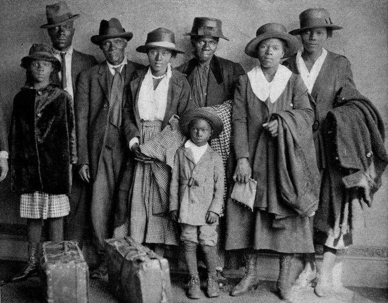 An African American family arriving in Chicago from the rural South during the Great Migration.