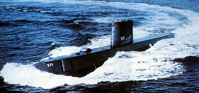 The USS Nautilus, the first nuclear-powered submarine. Much like a submarine sealing its hatches before a dive, a secure computing environment requires a rigorously enforced configuration protocol before being exposed to hostile networks.