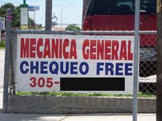 A sign demonstrating Spanglish by substituting the Spanish word "gratis" with the English word "free" exemplifies code-switching. This is a practical, sophisticated linguistic adaptation and is not symptomatic of a cognitive or communicative deficit.