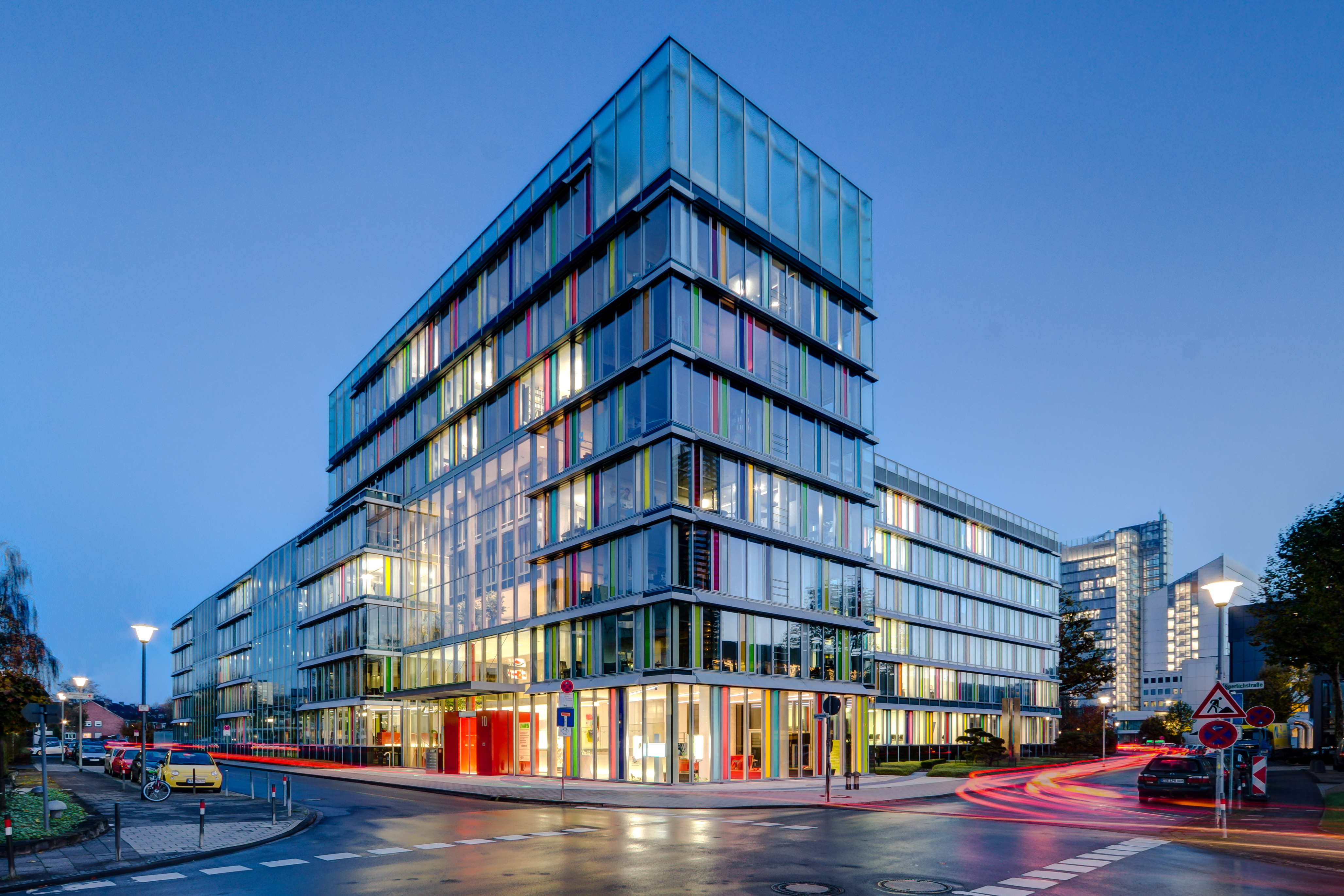 A modern commercial office building — the kind of premises 'occupied by the tenant for the purposes of a business' that brings a tenancy within Part II protection under section 23(1).