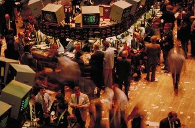 The trading floor of the New York Stock Exchange illustrates the vast capital markets where broker-dealers operate as essential conduits for equity and debt.