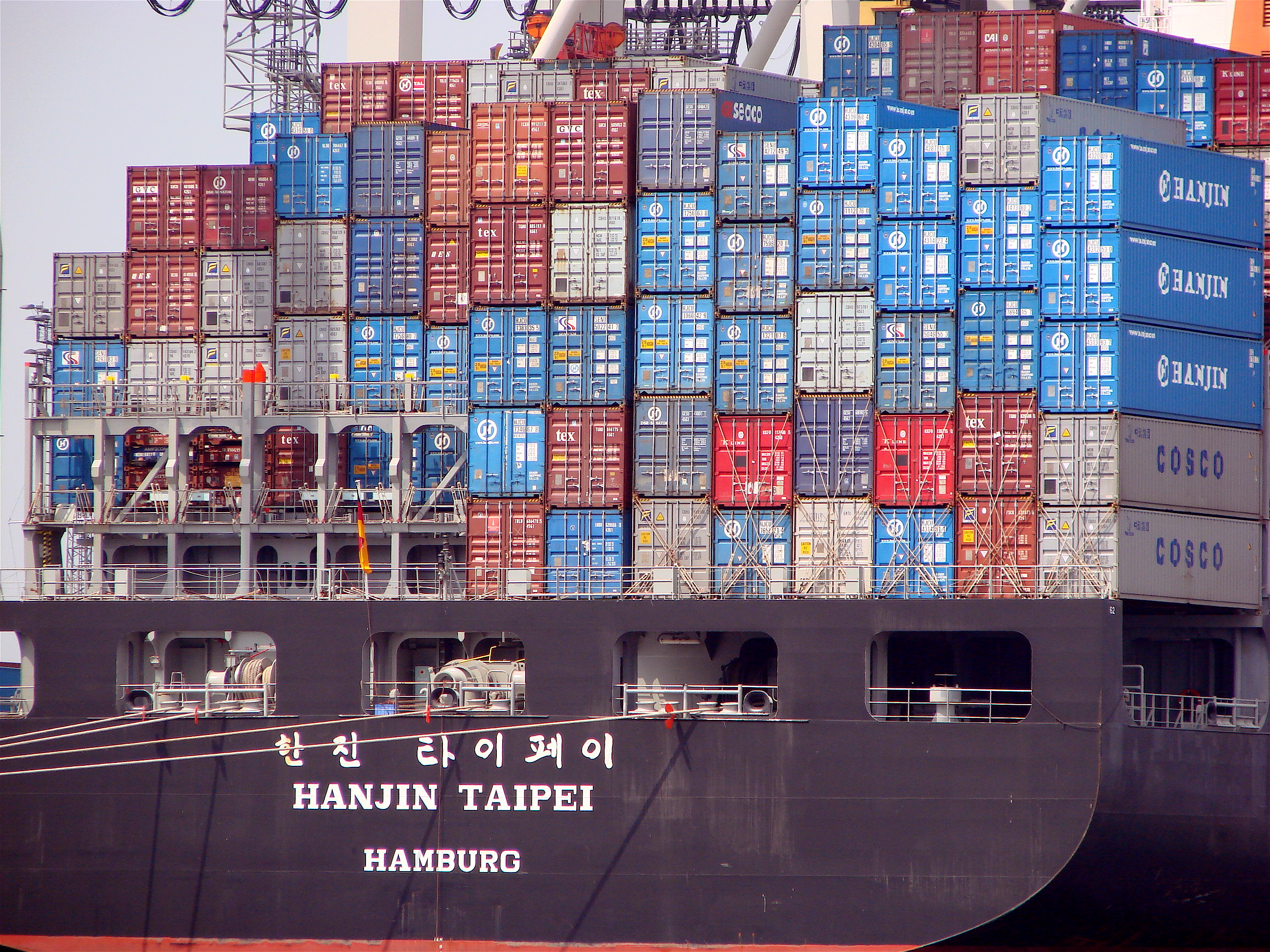 Just as physical shipping containers revolutionized global logistics by creating a universal standard for cargo transport, software containers standardize the packaging and deployment of code across any computing infrastructure.