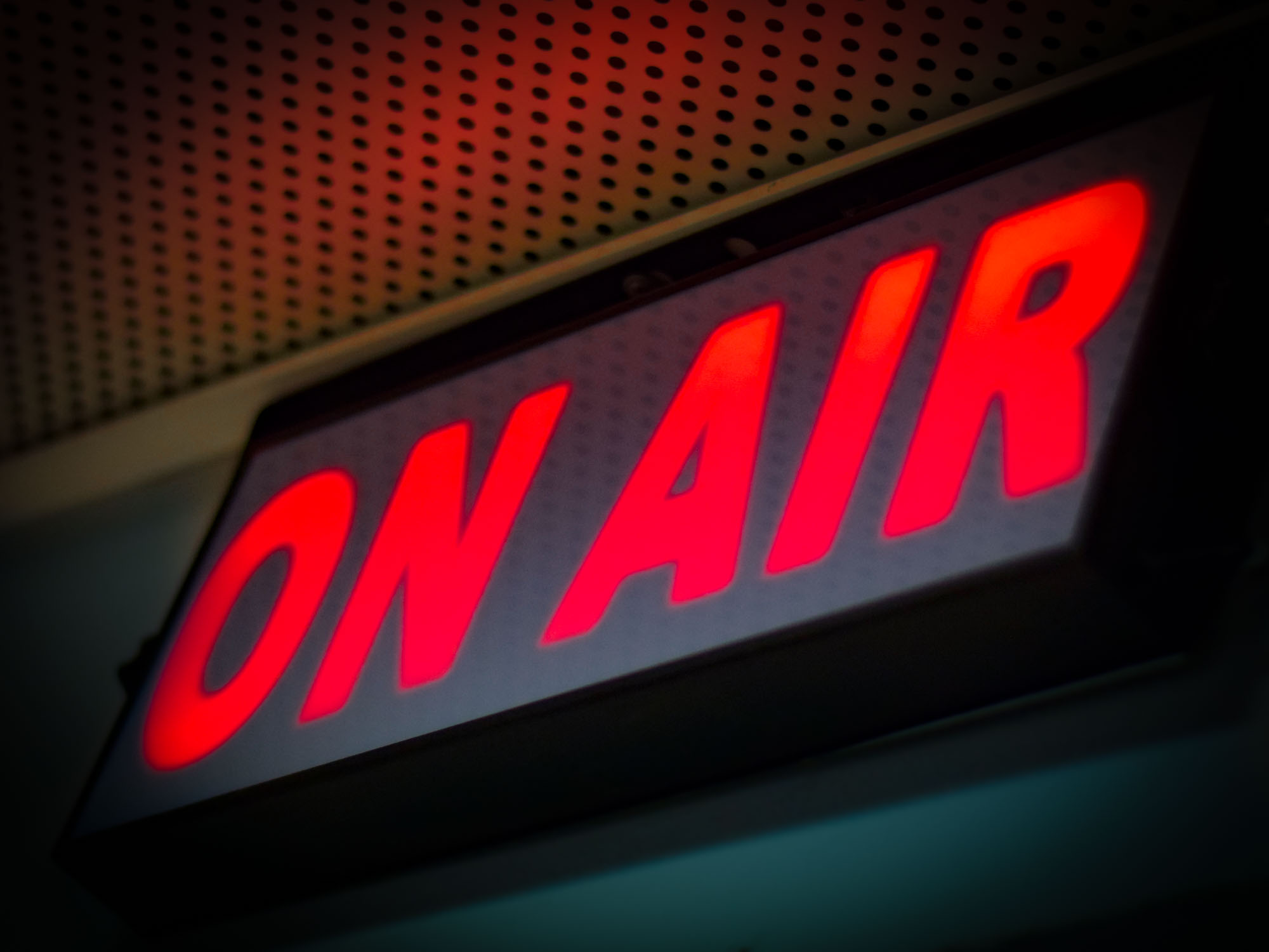 Live broadcasts and interviews are inherently fluid. Because pre-approval of every spoken word is impossible, these unscripted environments are regulated as public appearances subject to post-use firm supervisory procedures.