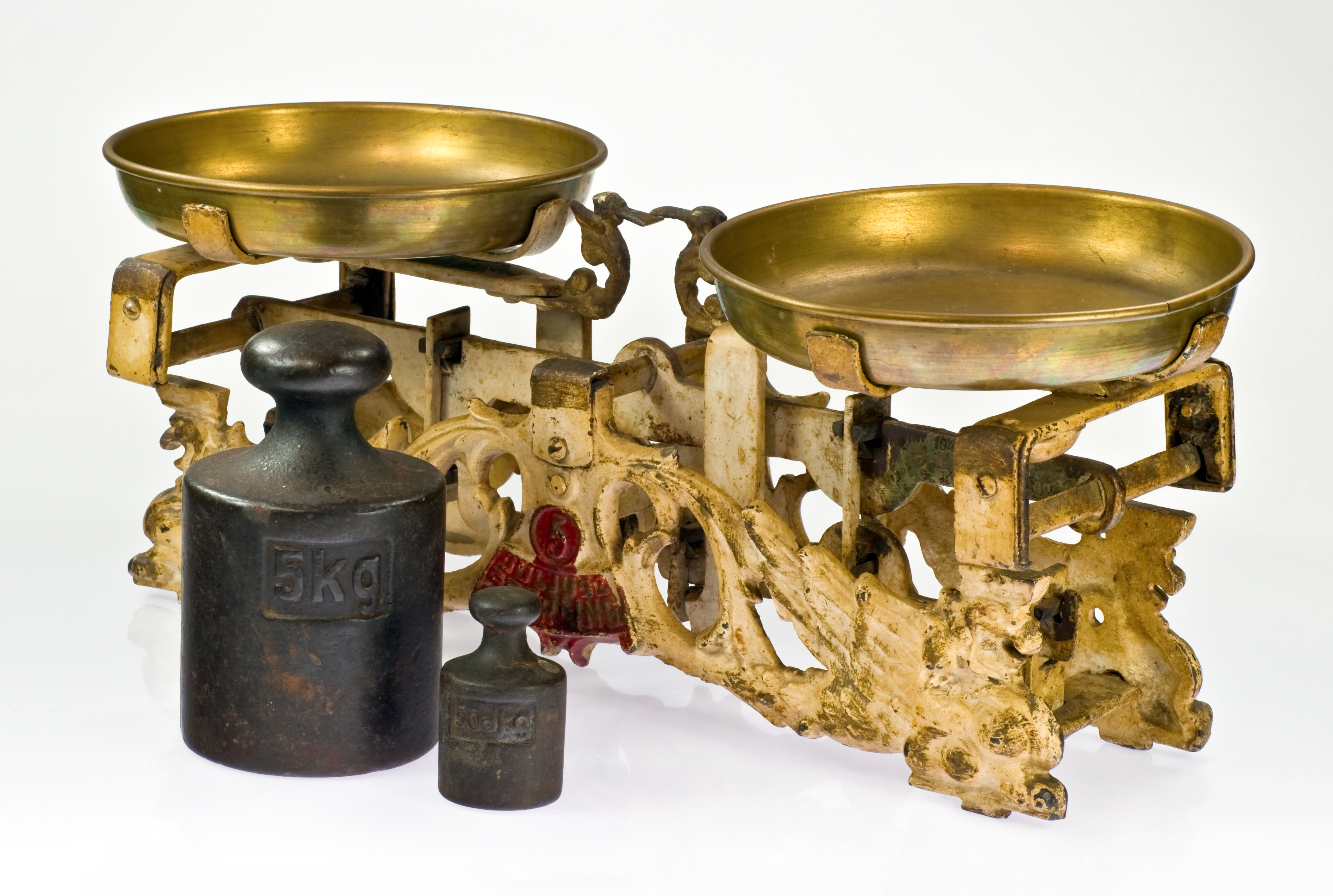 Using a physical balance scale provides students with objective, empirical evidence that mass is conserved regardless of how an object's structural shape is altered.