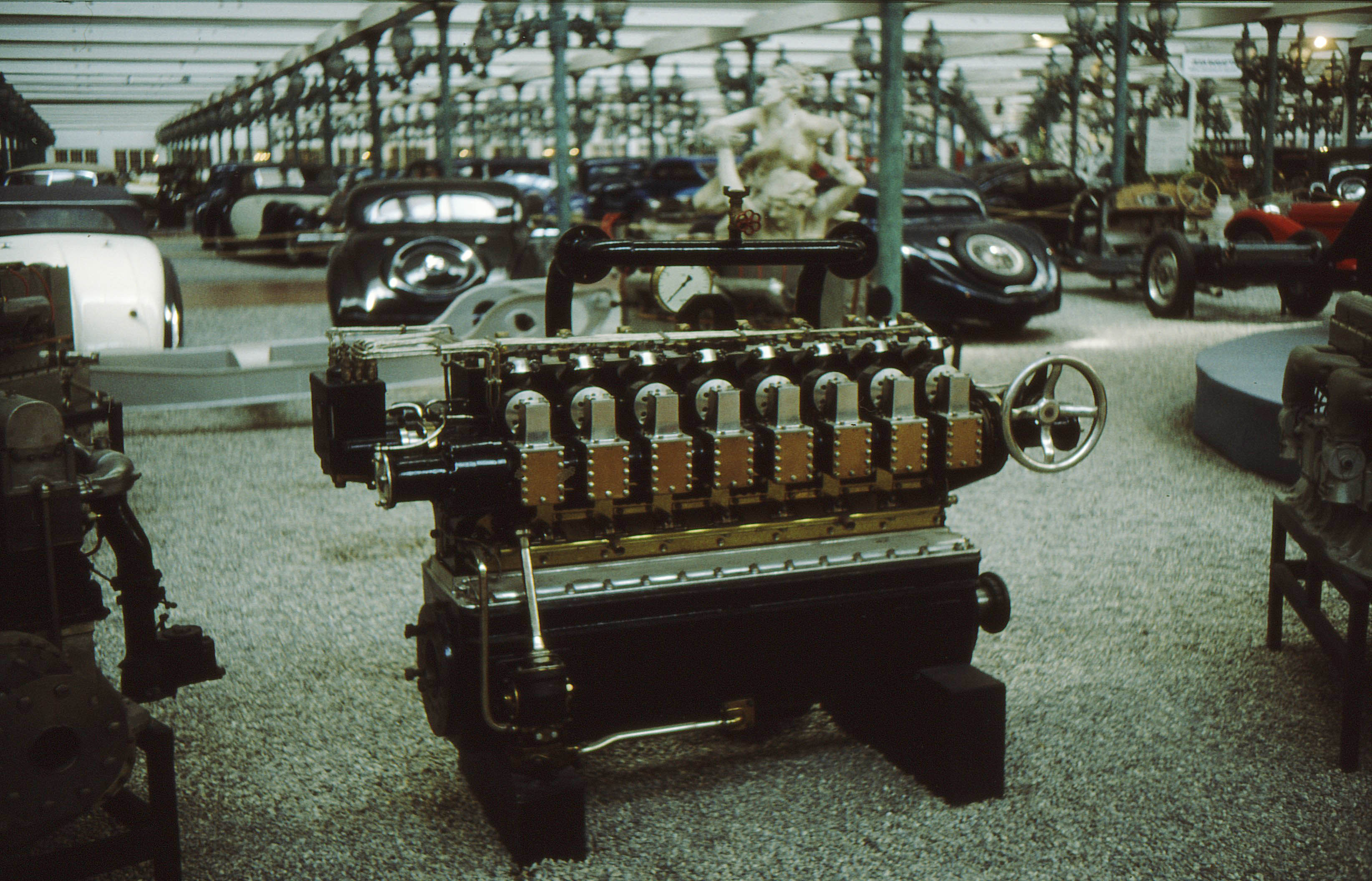 An automobile engine is an intermediate good. Its value is not counted directly in GDP to avoid double-counting the final value of the assembled car it goes into.