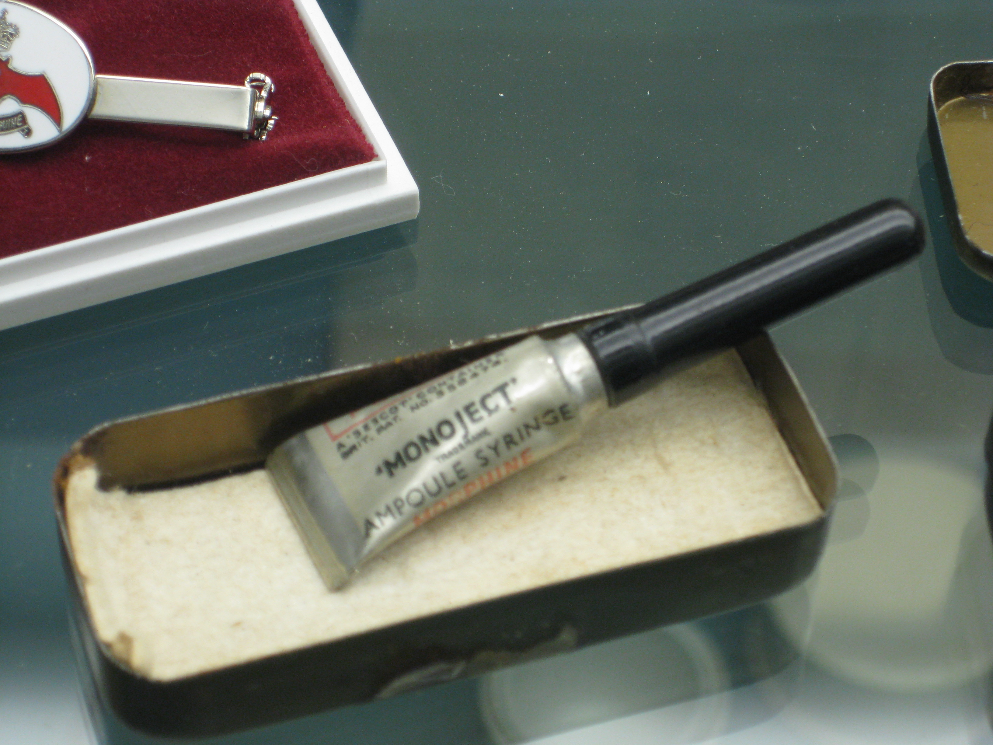 An ampoule of morphine. Administration of any mind-altering opioid or CNS depressant immediately invalidates a patient's legal capacity to sign a consent form.