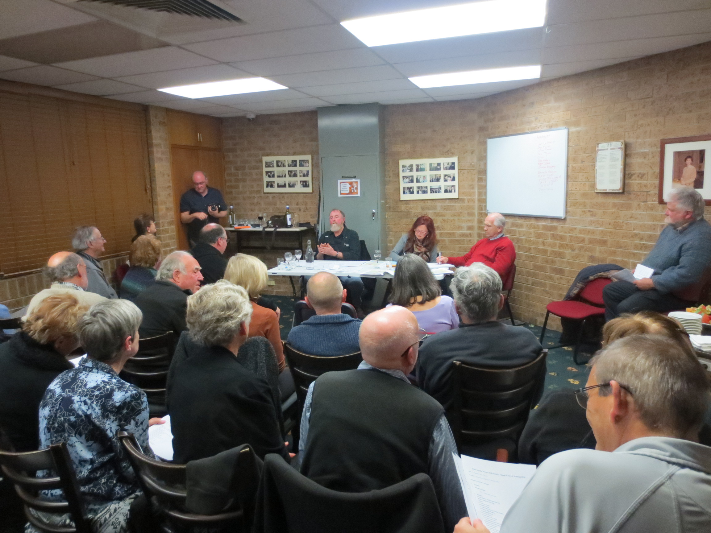 An AGM in session — shareholders exercise their voting control here; a lender providing debt finance has no seat and no vote at this meeting, however much it has advanced.