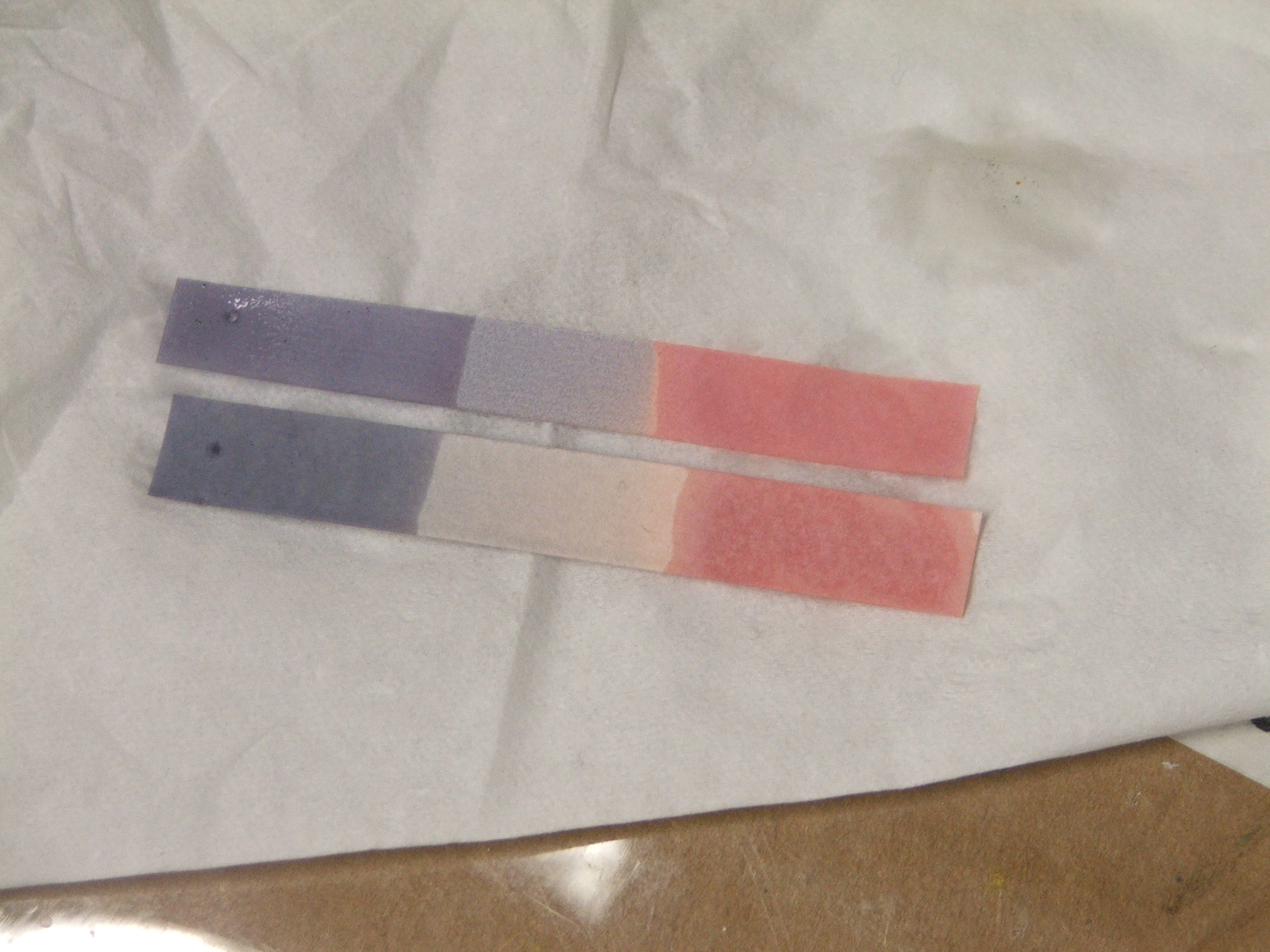 Litmus paper is a chemical indicator dye used to quickly identify whether a solution is acidic (turning blue litmus red) or basic (turning red litmus blue).