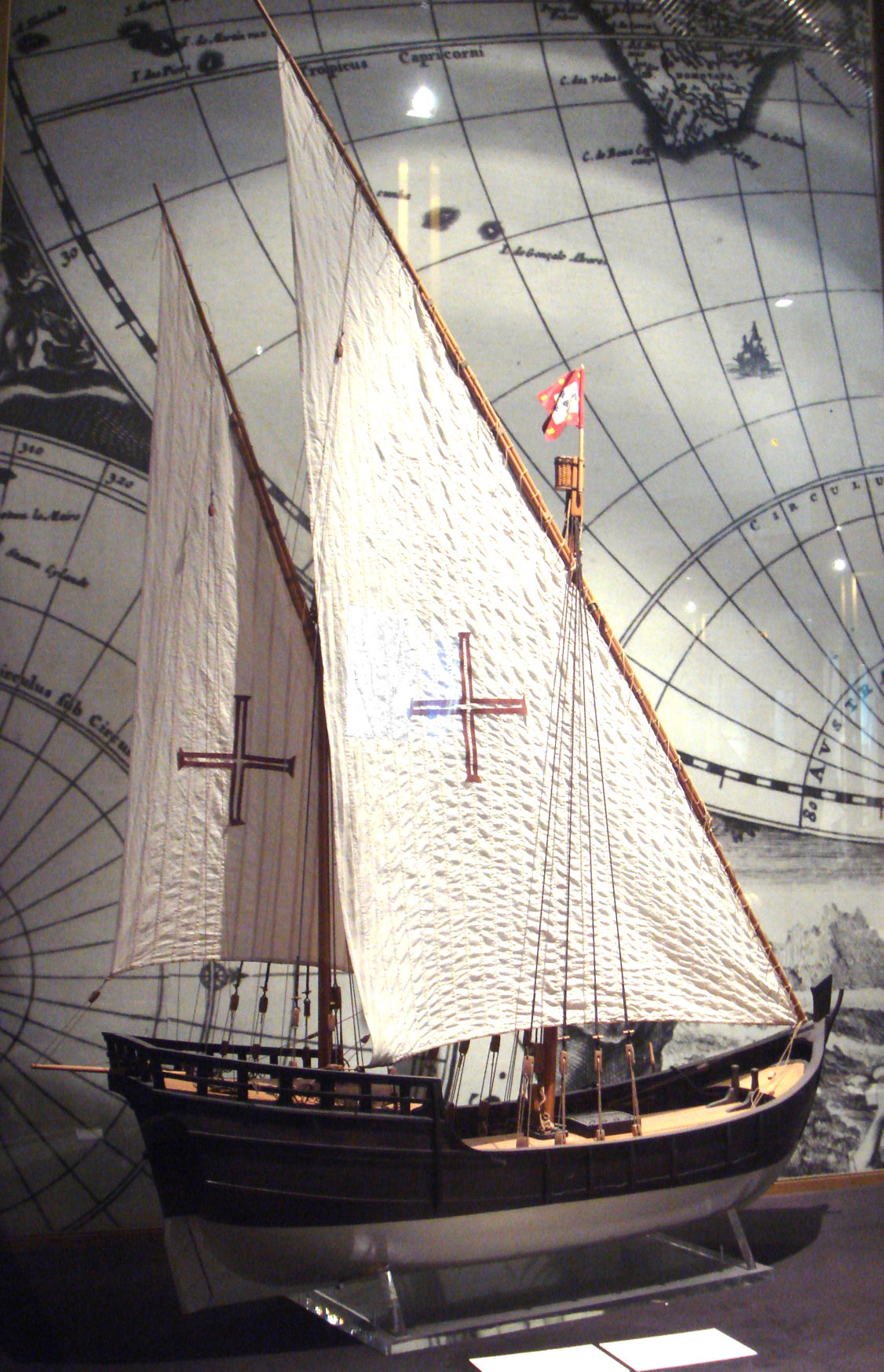 A model of a Portuguese caravel. Its innovative hybrid rigging—combining traditional square sails with triangular lateen sails—provided the speed and maneuverability necessary to explore uncharted, shallow coastlines and tack against head winds.