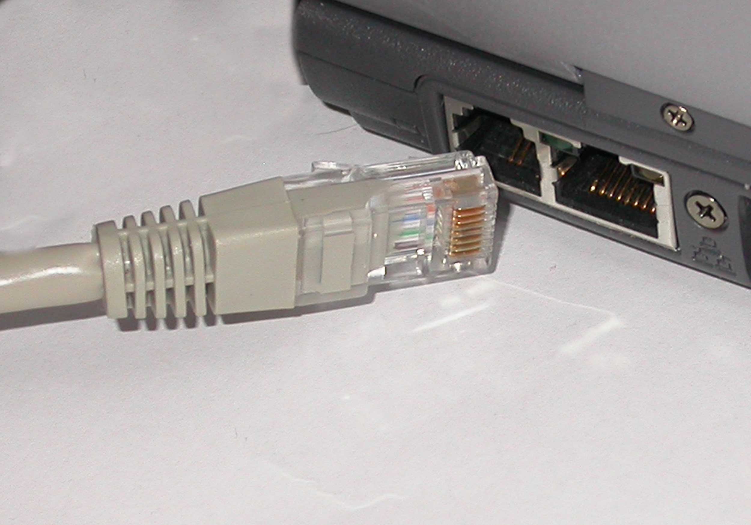 A twisted-pair copper network cable. At the Physical layer, all logical addressing and formatting are reduced to raw bit streams transmitted over physical media like copper wire, fiber optics, or radio frequencies.