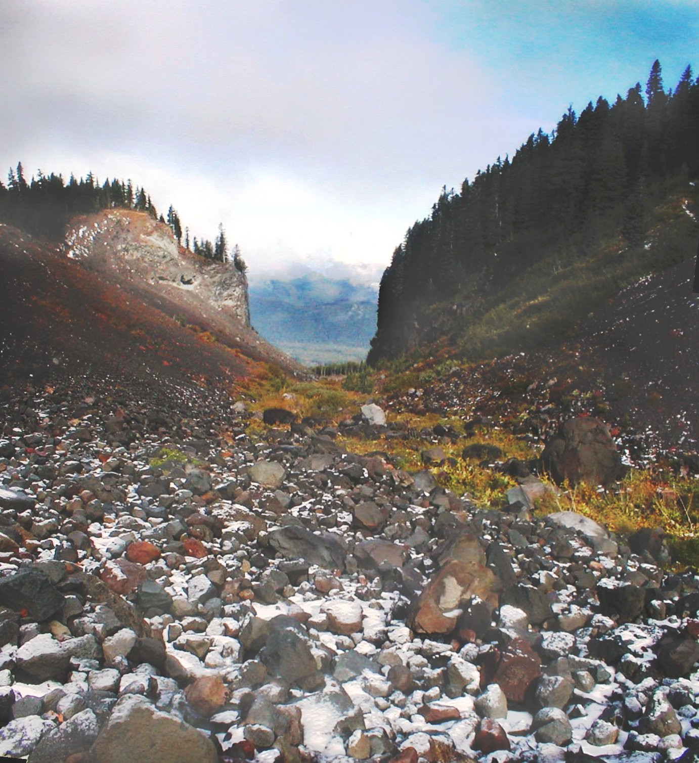 Unlike rivers that cut narrow V-shapes, slow-moving glaciers bulldoze the landscape to carve wide, U-shaped valleys.