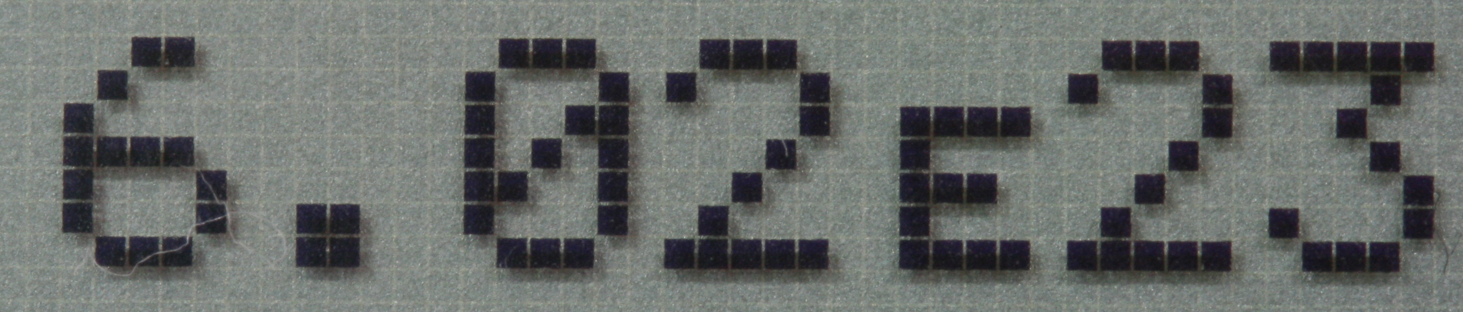 A scientific calculator utilizing "E notation" to display the Avogadro constant, where the "E" represents "times ten to the power of" the subsequent integer.