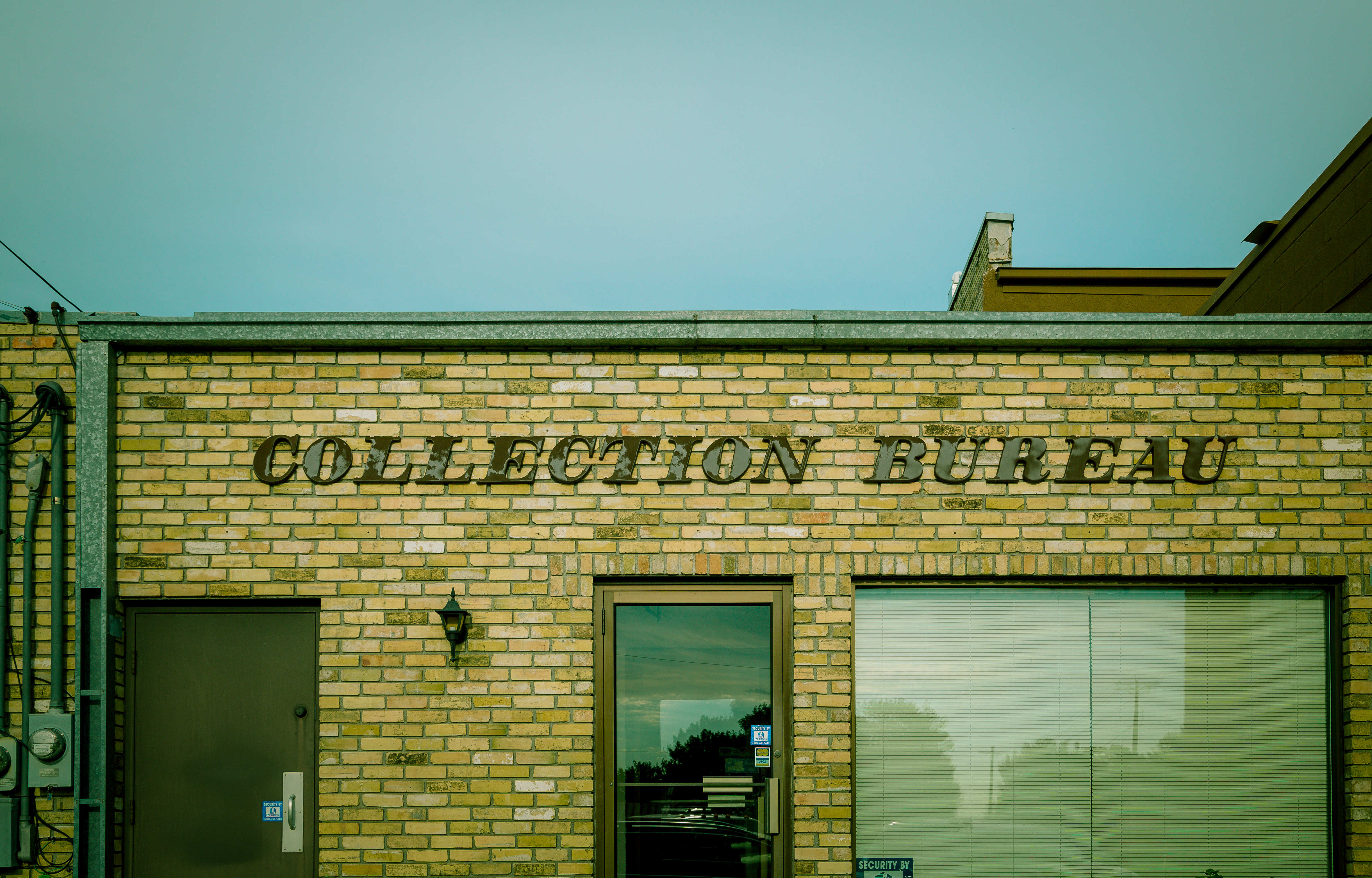 A debt collection agency — the standard example of a business whose main activity is a regulated financial service, and so cannot meet section 327(4)'s incidentality requirement.