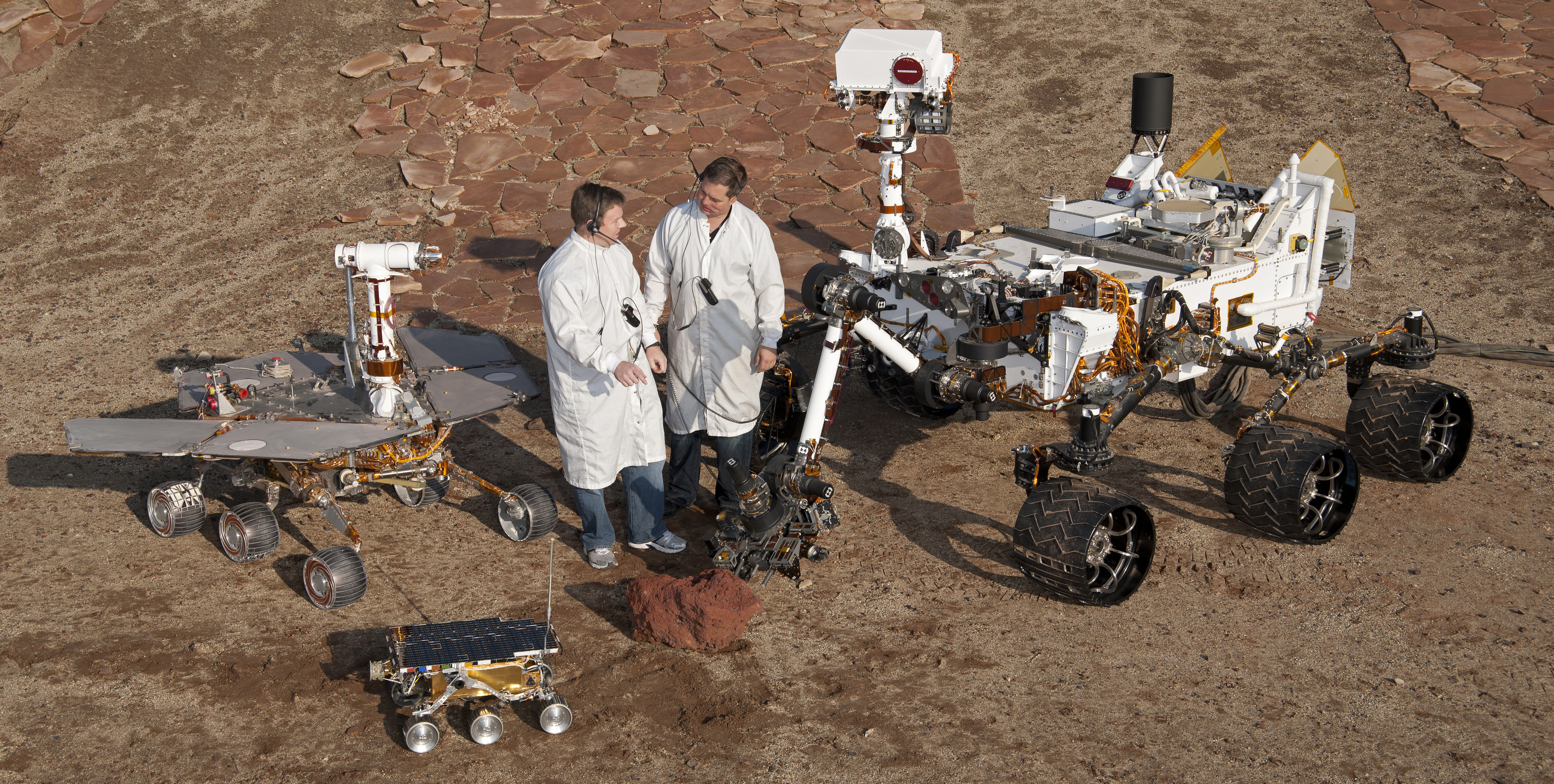 A space exploration program typically encompasses multiple interdependent projects—such as designing the rover (pictured), building the launch vehicle, and coding the communication arrays—managed together to achieve a unified mission.