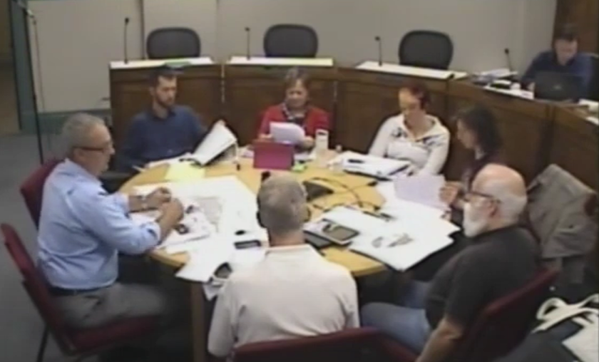 A city council meeting in Montpelier, Vermont. Local municipal governments handle the immediate, practical realities of community living, such as emergency services and infrastructure.
