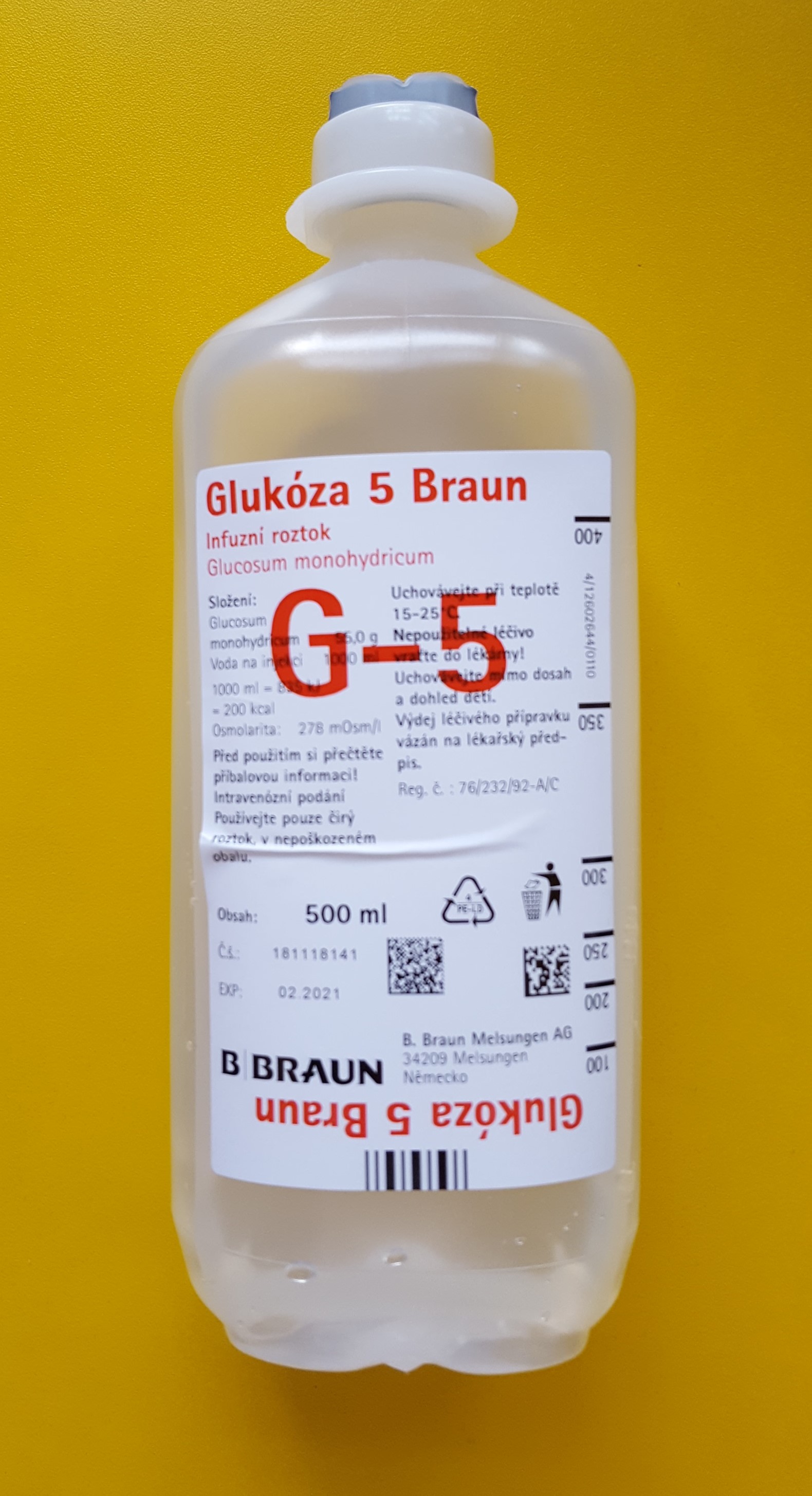 A 500 mL bag of 5% Dextrose in water. While the text example uses a 1000 mL bag, for this 500 mL bag, the patient would receive exactly 25 grams of dissolved dextrose (500 × 0.05).