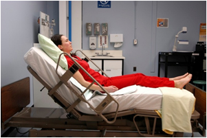 Placing a client in Fowler's position with flexed knees mechanically reduces tension on the abdominal wall, a crucial immediate intervention for wound evisceration.