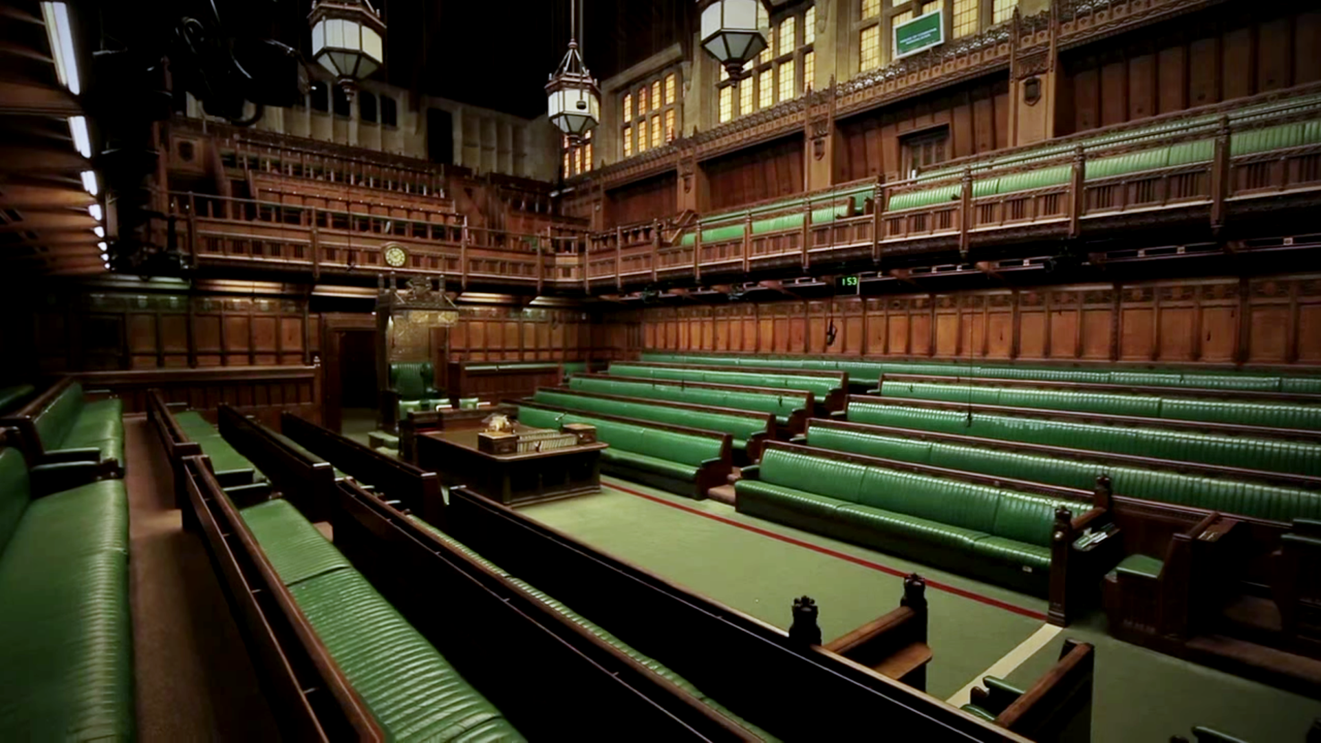 The House of Commons chamber, where government ministers sit as MPs — the fusion of executive and legislature that makes the UK's separation of powers only partial.