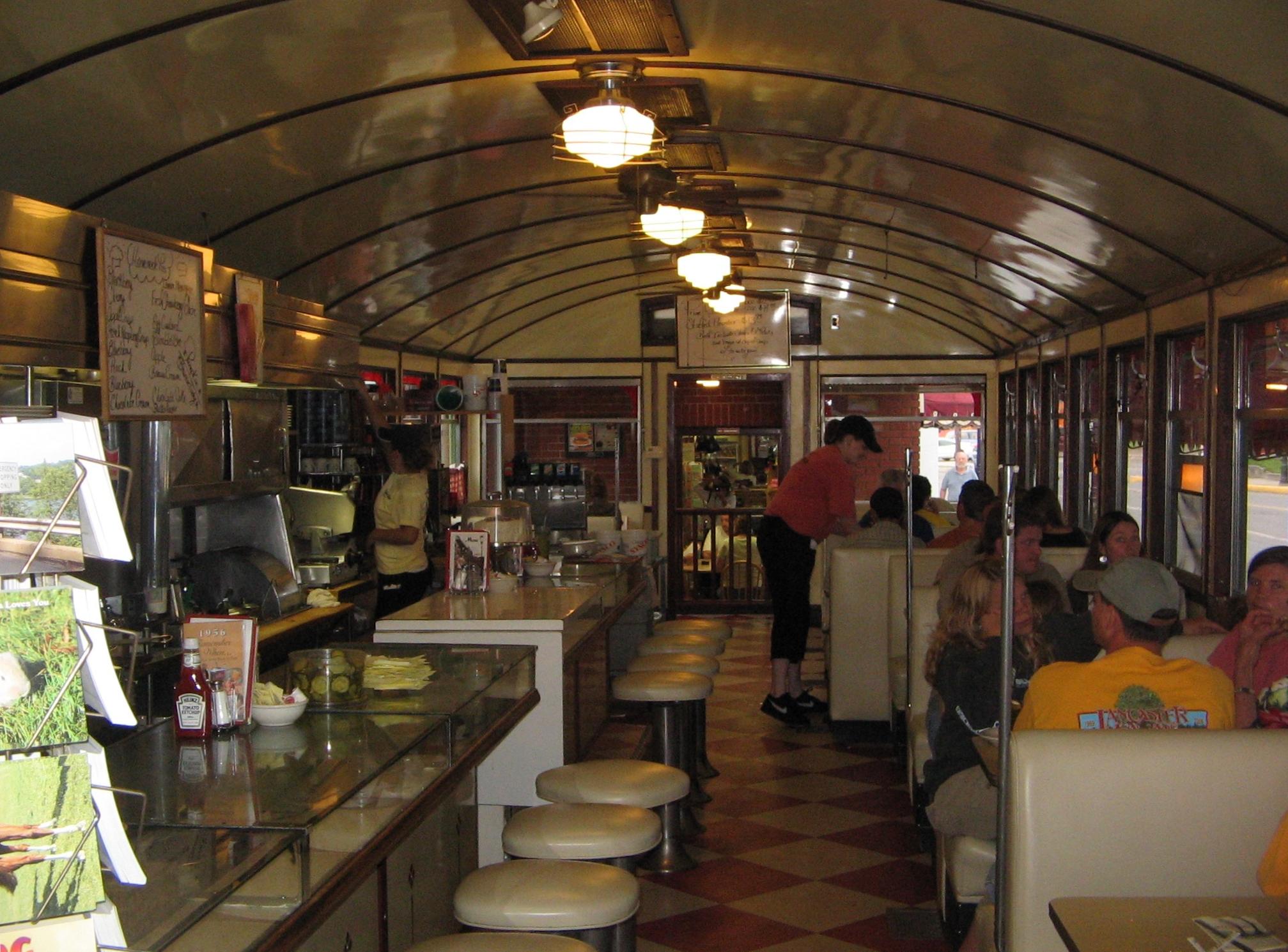 Ordering coffee at a diner establishes an implied-in-fact contract; the patron's conduct creates a legally binding obligation to pay, even without a written or verbal agreement.